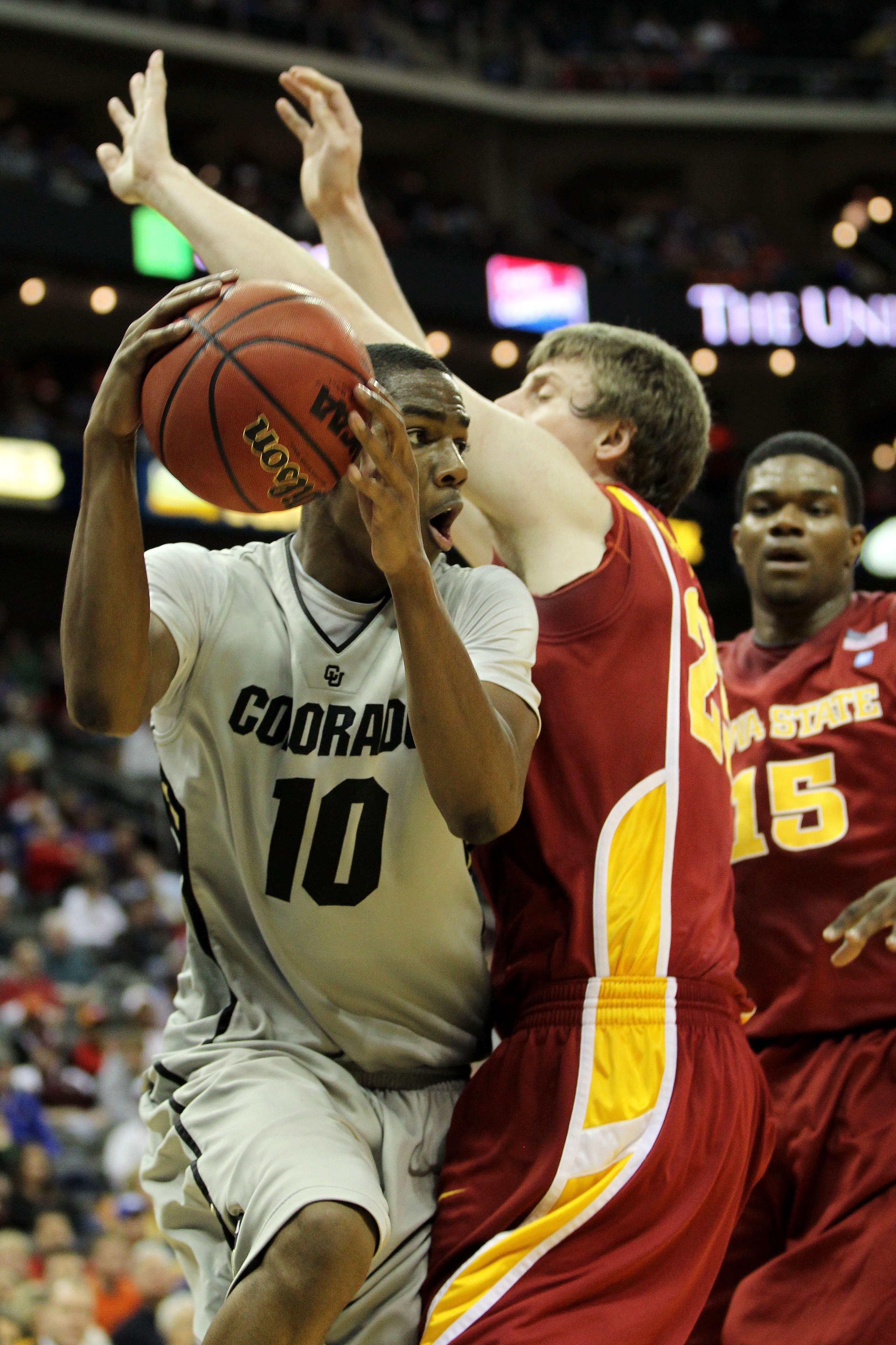 KANSAS CITY, MO - MARCH 09:  Alec Burks #10 of the Colorado Buffaloes drives with the ball against Jamie Vanderbeken #23 of the Iowa State Cyclones during their first round game in the 2011 Phillips 66 Big 12 Men's Basketball Tournament at Sprint Center o