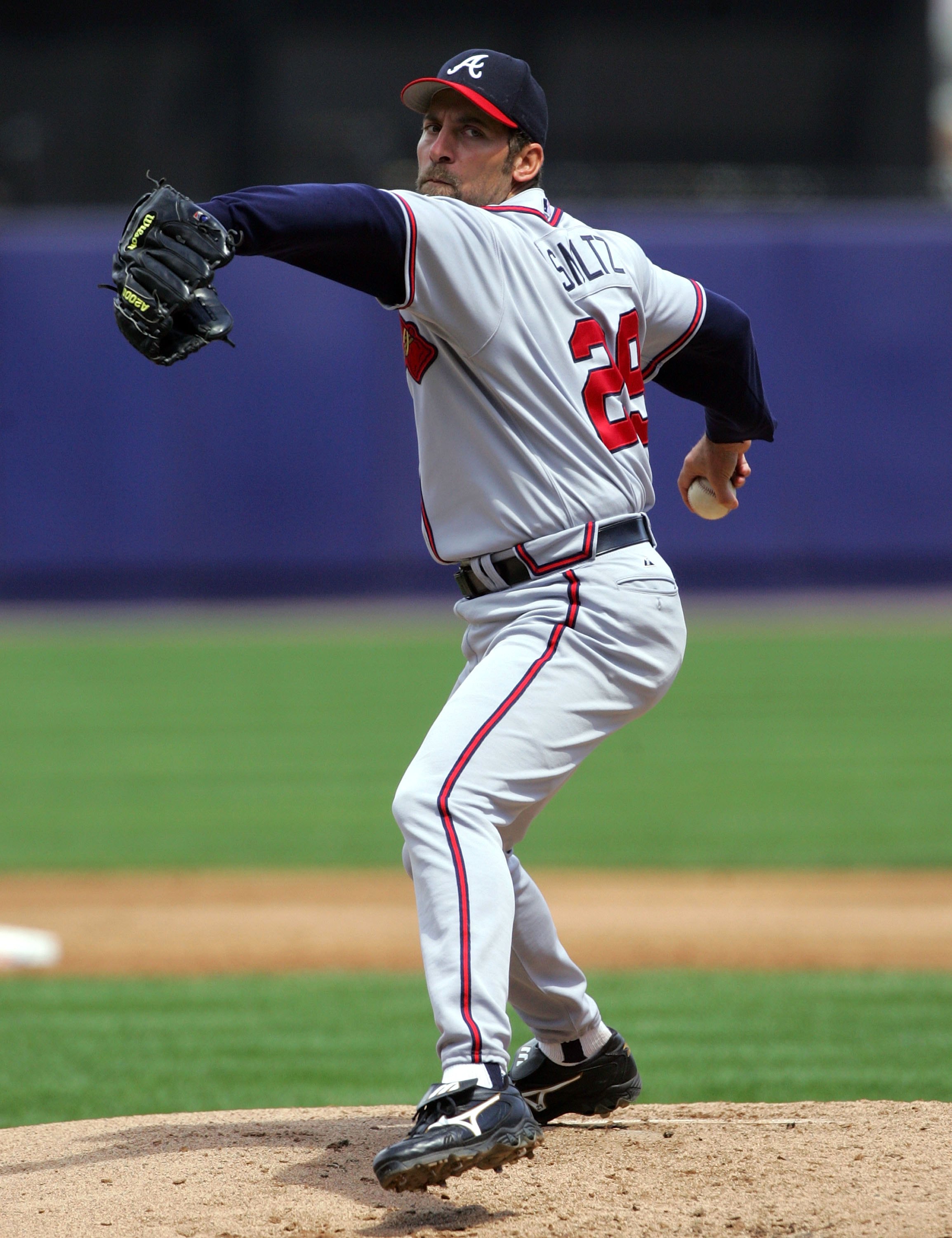NEW YORK - MAY 07:  John Smoltz #29 of the Atlanta Braves delivers a pitch against the New York Mets on May 7, 2006 at Shea Stadium in the Flushing neighborhood of the Queens borough of New York City.  (Photo by Jim McIsaac/Getty Images)