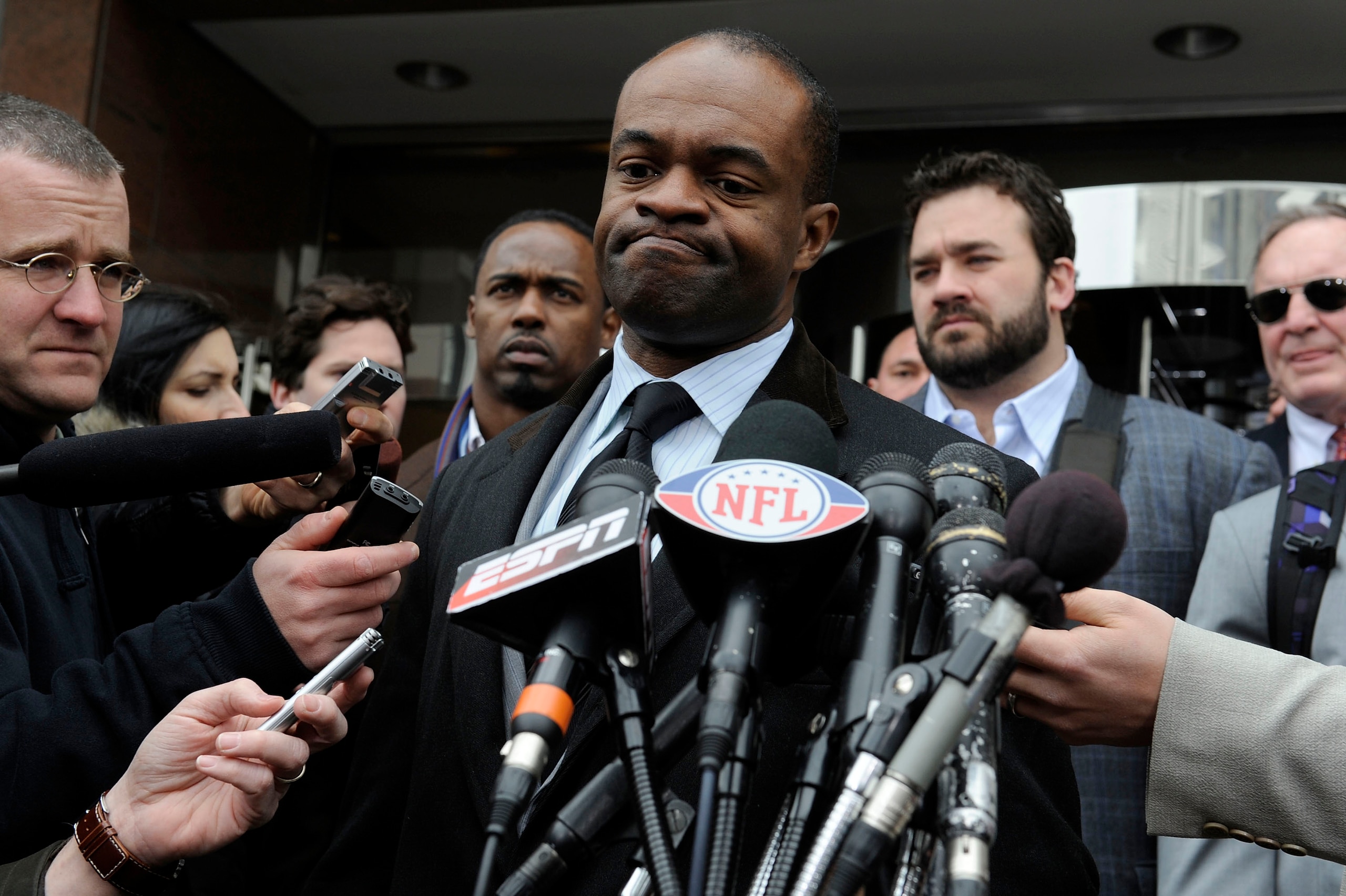 WASHINGTON, DC - MARCH 11:  NFL Players Association Executive Director DeMaurice Smith (C) speaks as he and a group of player representatives arrive for labor talks at the Federal Mediation and Conciliation Service building March 11, 2011 in Washington, D