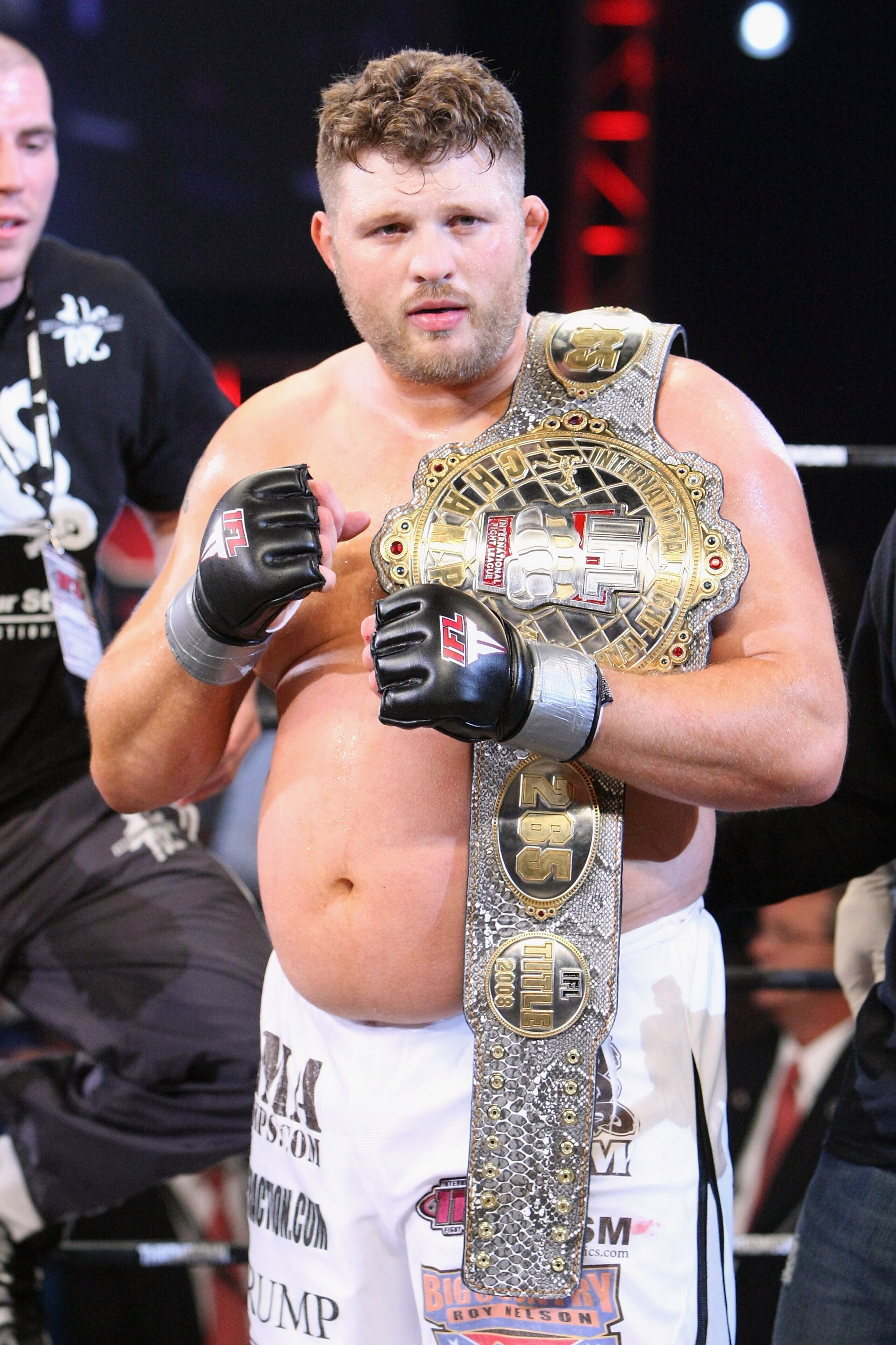 UNCASVILLE, CT - MAY 16: Roy Nelson (White Trunks) of the Lions Den celebrates after beating Brad Imes of the MilesTech Fighting System during their bout presented by the International Fighting League at the Mohegan Sun Arena May 16, 2008 in Uncasville, UNCASVILLE, CT - MAY 16: Roy Nelson (White Trunks) of the Lions Den celebrates after beating Brad Imes of the MilesTech Fighting System during their bout presented by the International Fighting League at the Mohegan Sun Arena May 16, 2008 in Uncasville,