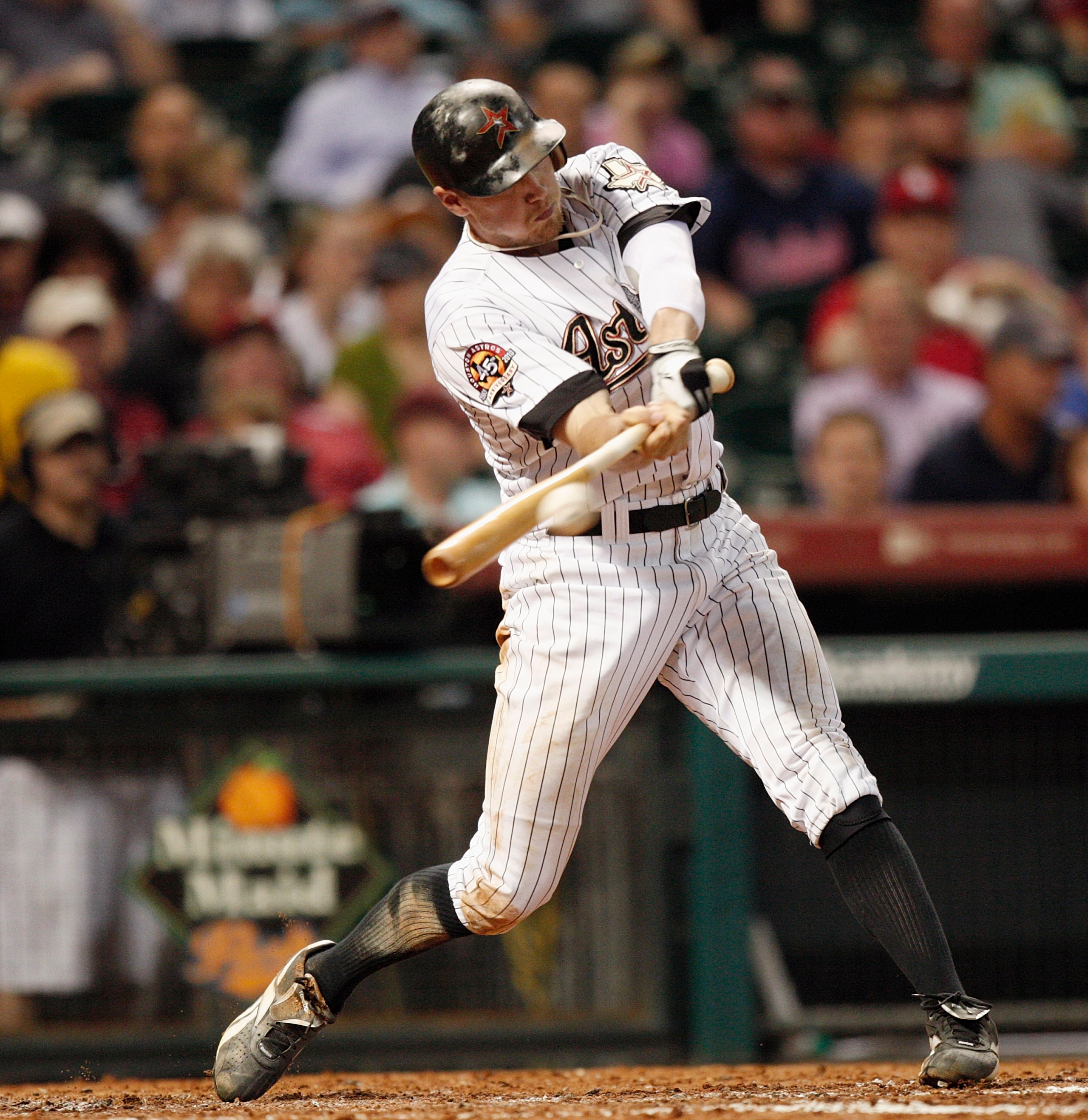 HOUSTON - AUGUST 30:  Hunter Pence #9 of the Houston Astros drives the ball up the middle against the St. Louis Cardinlas at Minute Maid Park on August 30, 2010 in Houston, Texas. The Astros beat the Cardinals 3-0.  (Photo by Bob Levey/Getty Images)