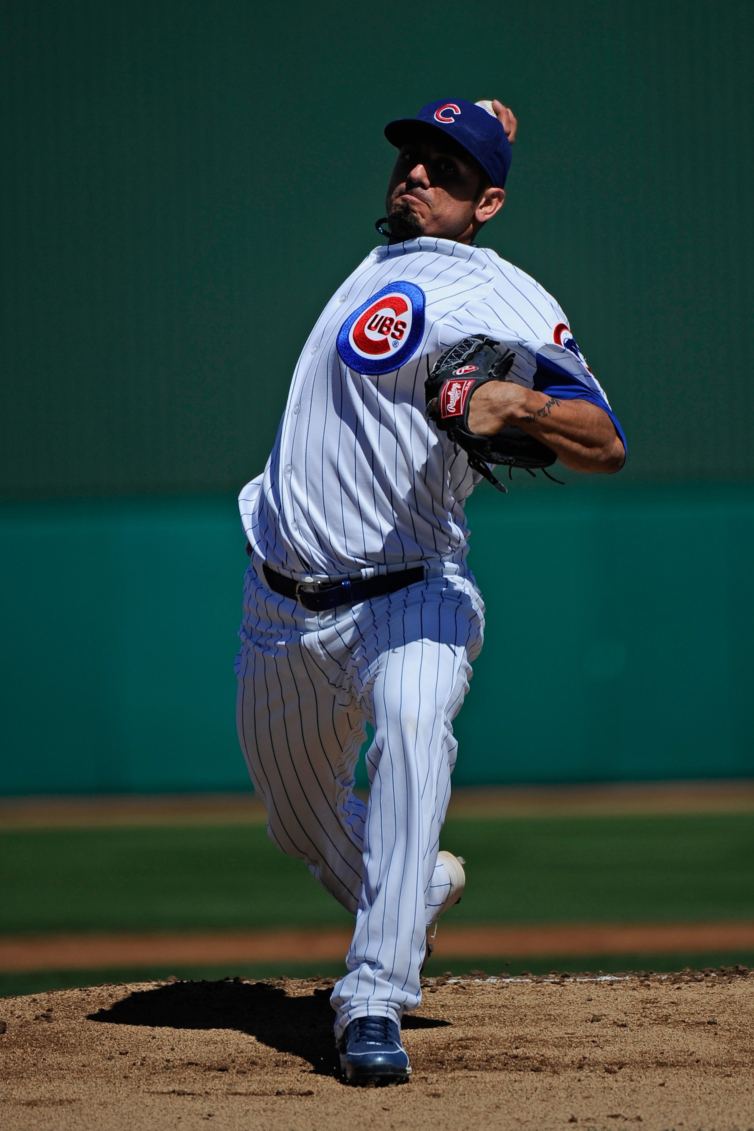 MESA, AZ - MARCH 09:  Matt Garza #17 pitcher of the Chicago Cubs throws a ptich against the Kansas City Royals during the spring training baseball game at HoHoKam Stadium on March 9, 2011 in Mesa, Arizona.  (Photo by Kevork Djansezian/Getty Images)