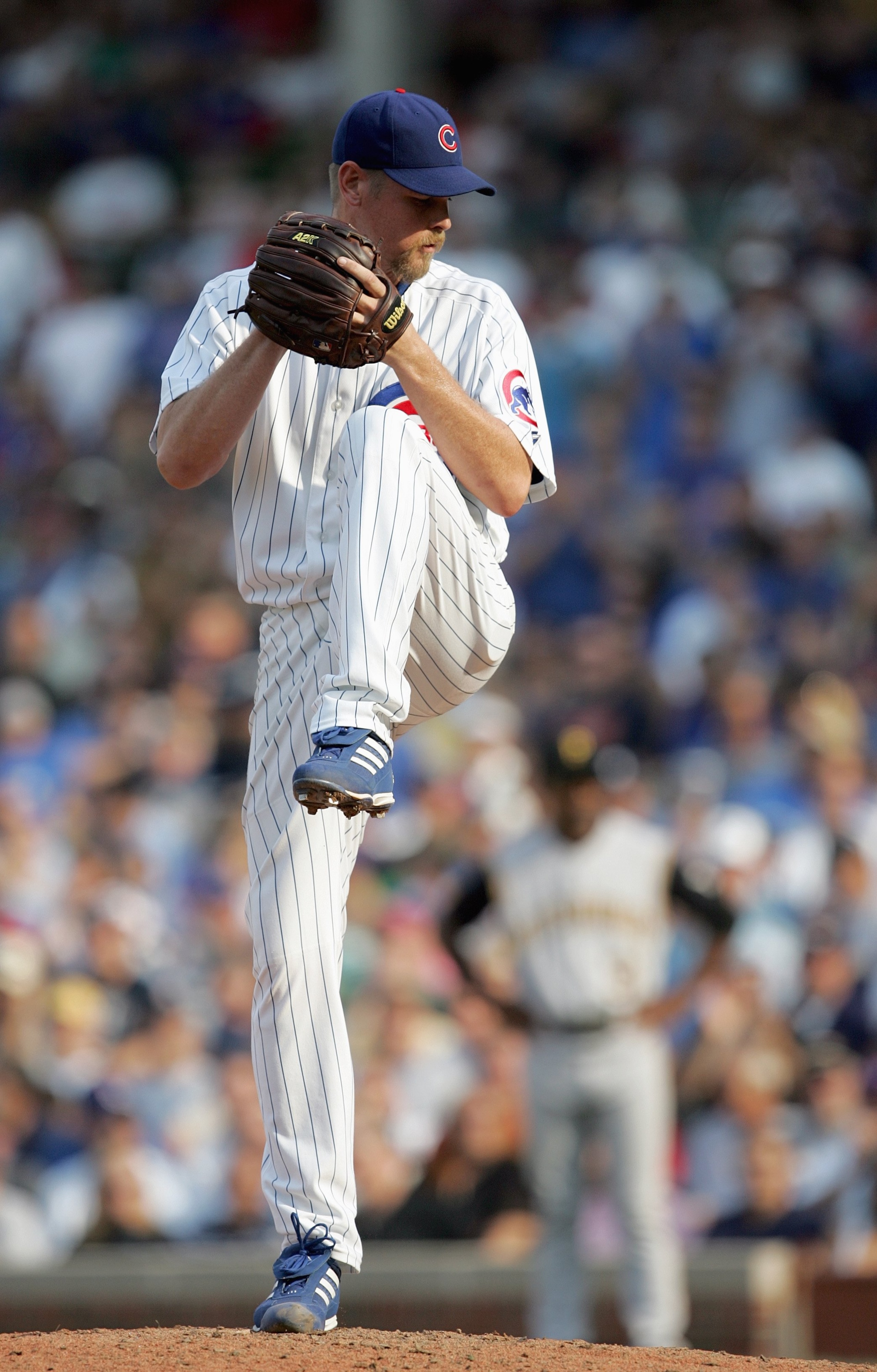 CHICAGO - SEPTEMBER 21: Kerry Wood #34 of the Chicago Cubs delivers the pitch during the game against the Pittsburgh Pirates on September 21, 2007 at Wrigley Field in Chicago, Illinois. The Cubs defeated the Pirates 13-7. (Photo by Jonathan Daniel/Getty I