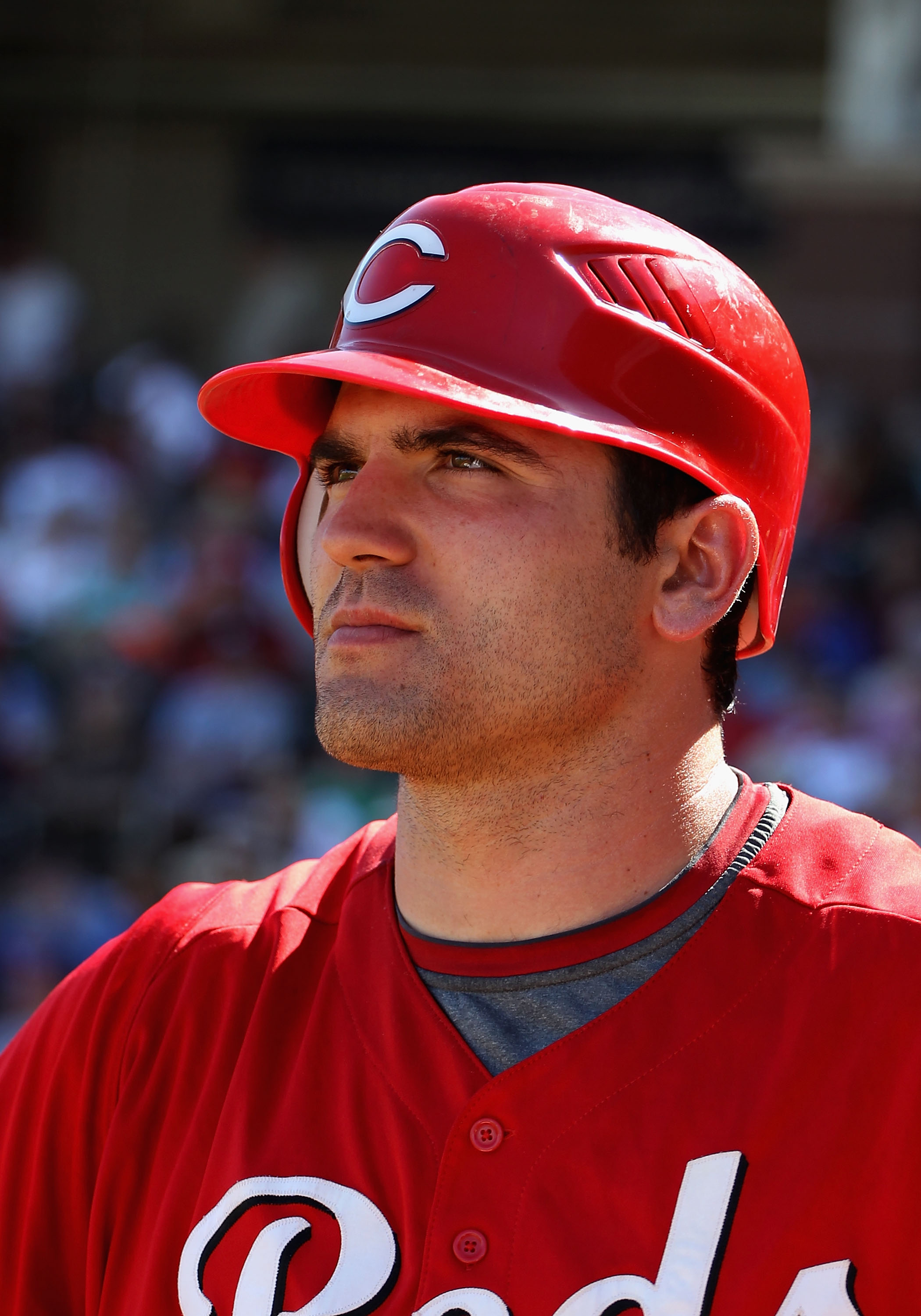SURPRISE, AZ - MARCH 11:  Joey Votto #19 of the Cincinnati Reds waits to bat during the third inning of the spring training game against the Texas Rangers at Surprise Stadium on March 11, 2011 in Surprise, Arizona.  (Photo by Christian Petersen/Getty Imag