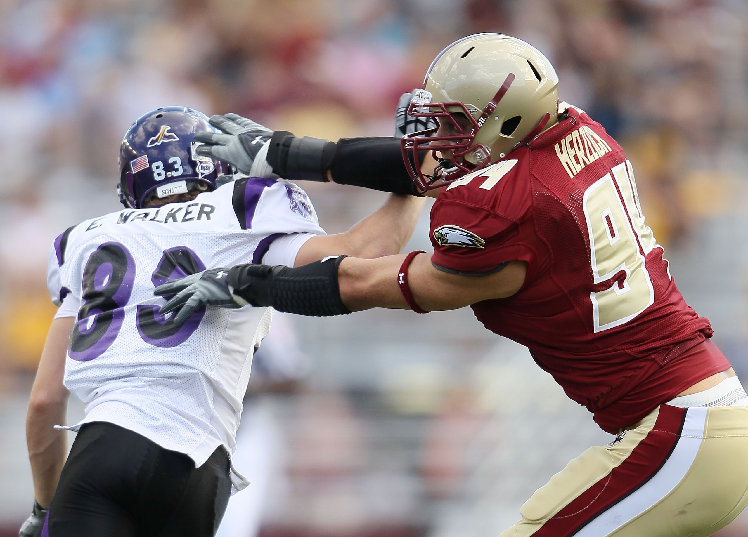 CHESTNUT HILL, MA - SEPTEMBER 04:  Mark Herzlich #94 of the Boston College Eagles blocks Erik Walker #83 of the Weber State Wildcats on September 4, 2010 at Alumni Stadium in Chestnut Hill, Massachusetts. Boston College defeated Weber State 38-20.  (Photo