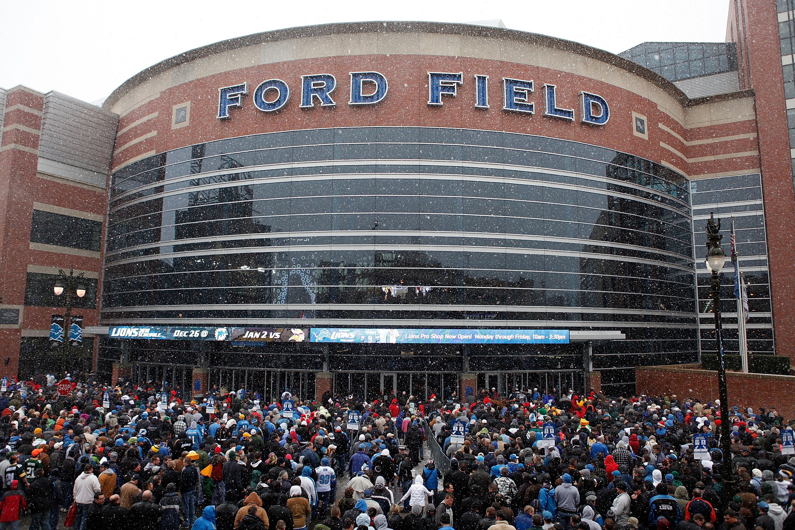 DETROIT - DECEMBER 12:  People enter Ford Field prior to the start of the game between the Green Bay Packers and the Detroit Lions at Ford Field on December 12, 2010 in Detroit, Michigan. Ford Field will host the NFL football game between the New York Gia