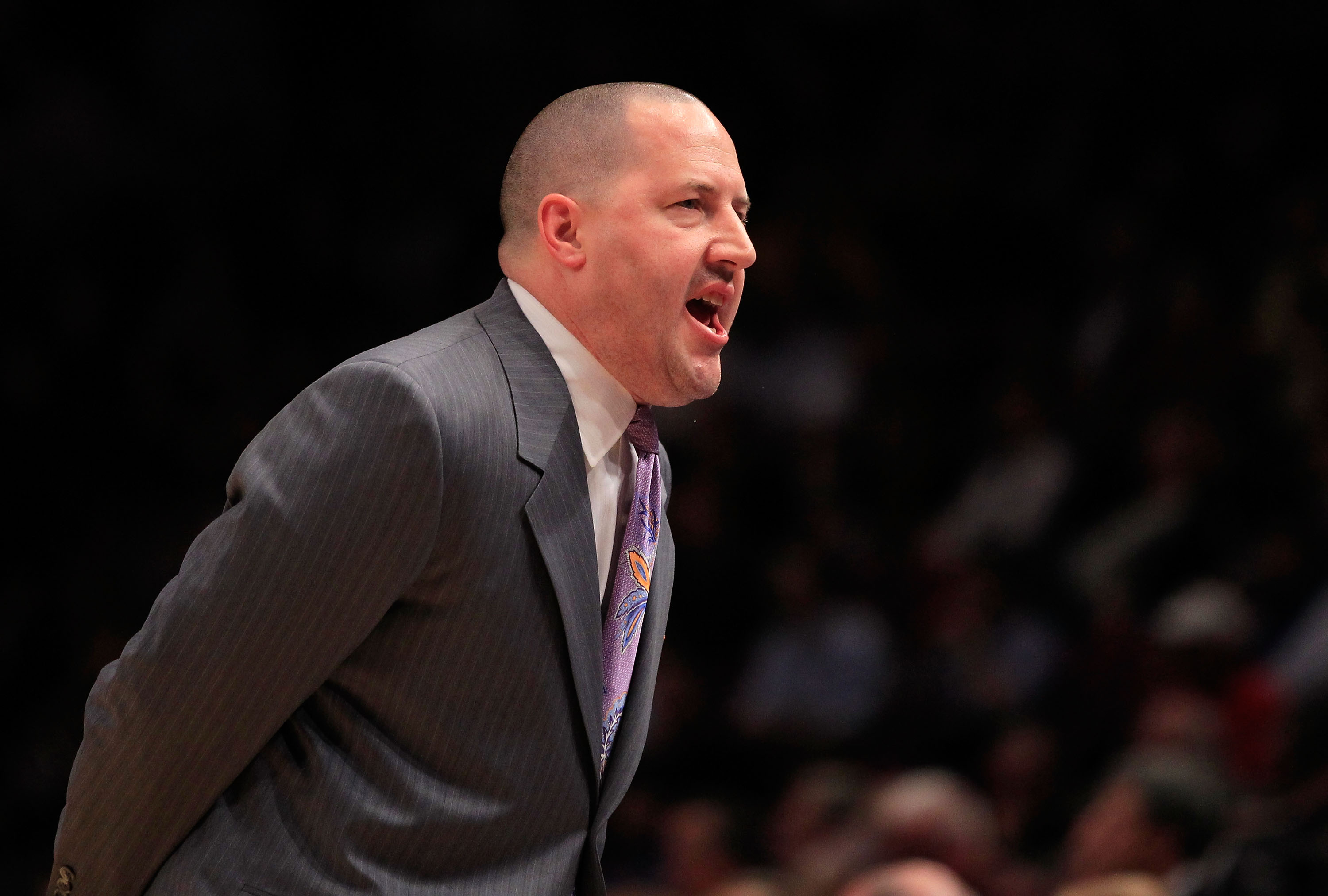 NEW YORK, NY - MARCH 10: Head coach Buzz Williams of the Marquette Golden Eagles yells from the bench during the game against the Louisville Cardinals during the quarterfinals of the 2011 Big East Men's Basketball Tournament presented by American Eagle O