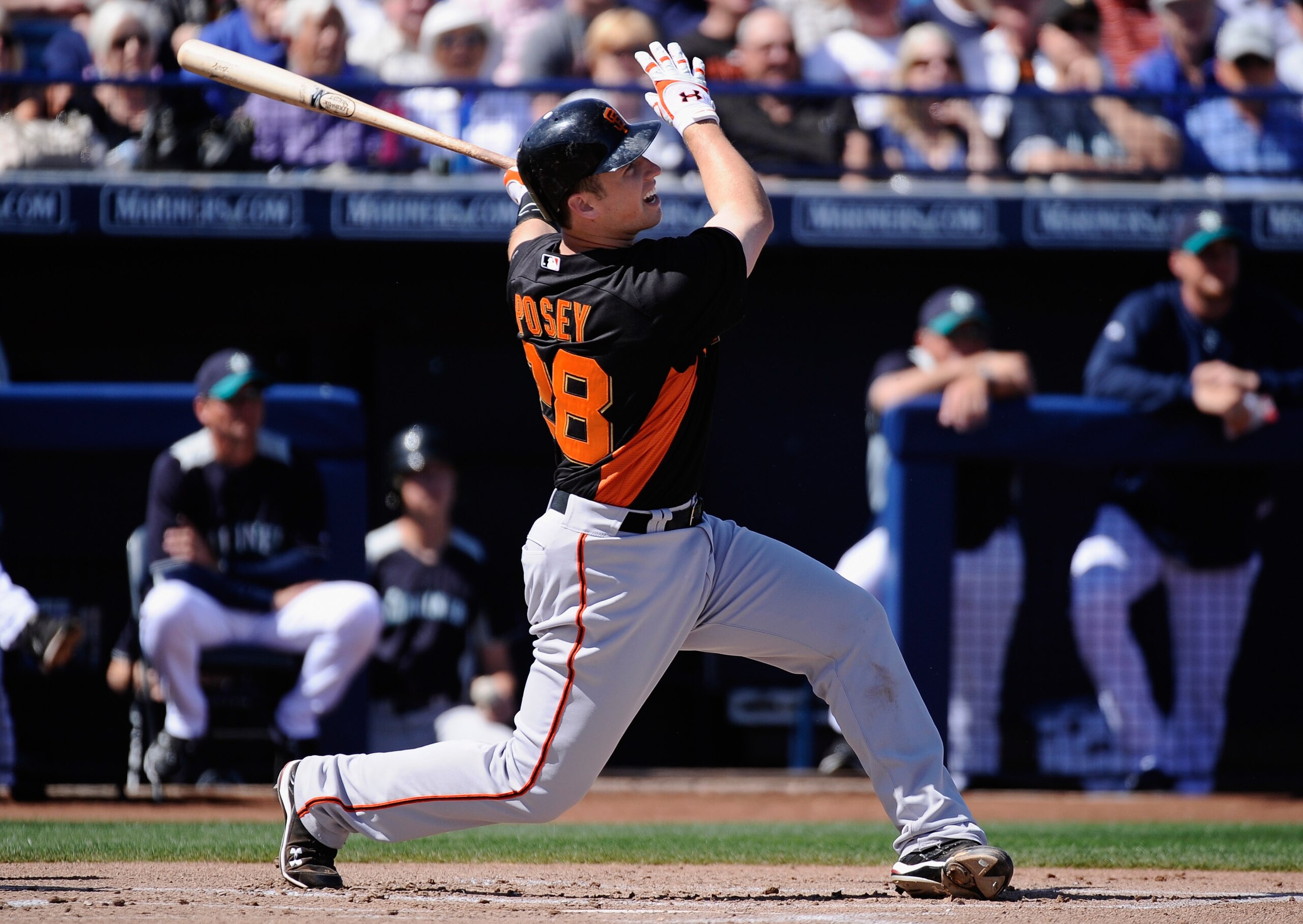 PEORIA, AZ - MARCH 08: Buster Posey #28 San Francisco Giants swings at a pitch against the Seattle Mariners during the spring training baseball game against at Peoria Stadium on March 8, 2011 in Peoria, Arizona. (Photo by Kevork Djansezian/Getty Images) PEORIA, AZ - MARCH 08: Buster Posey #28 San Francisco Giants swings at a pitch against the Seattle Mariners during the spring training baseball game against at Peoria Stadium on March 8, 2011 in Peoria, Arizona. (Photo by Kevork Djansezian/Getty Images)