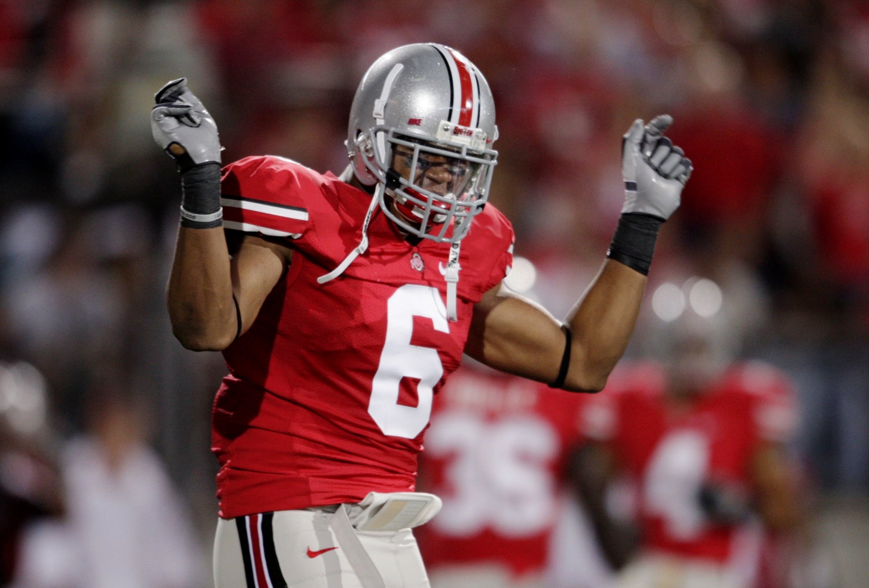 COLUMBUS, OH - SEPTEMBER 12:  Linebacker Etienne Sabino #6 of the Ohio State Buckeyes celebrates after stopping C.J. Gable #2 of the USC Trojans (not pictured) during the first quarter of the game at Ohio Stadium on September 12, 2009 in Columbus, Ohio. (