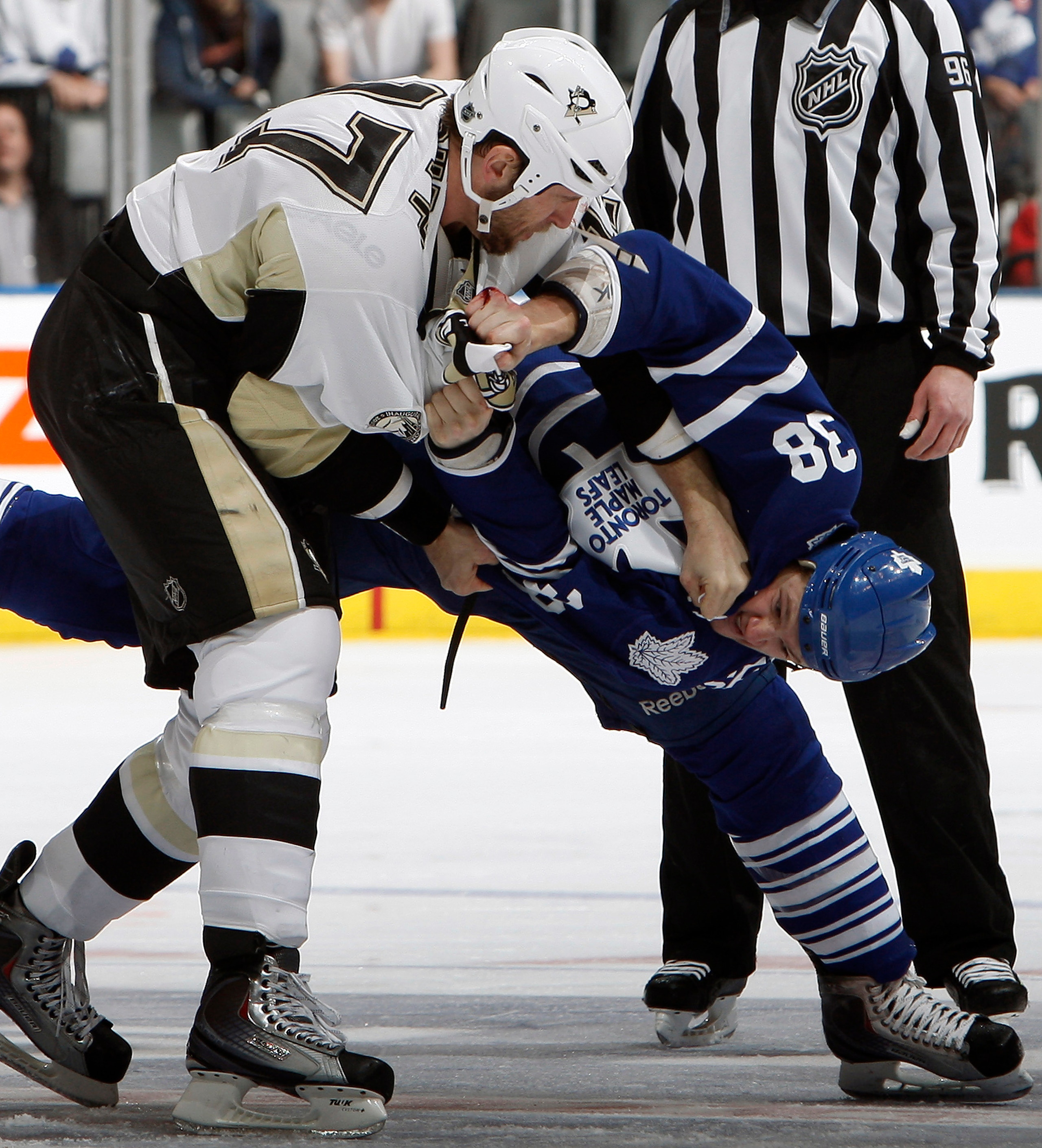 TORONTO, CANADA - FEBRUARY 26: Jay Rosehill #38 of the Toronto Maple Leafs fights Mike Rupp #17 of the Pittsburgh Penguins during game action at the Air Canada Centre February 26, 2011 in Toronto, Ontario, Canada. (Photo by Abelimages/Getty Images)