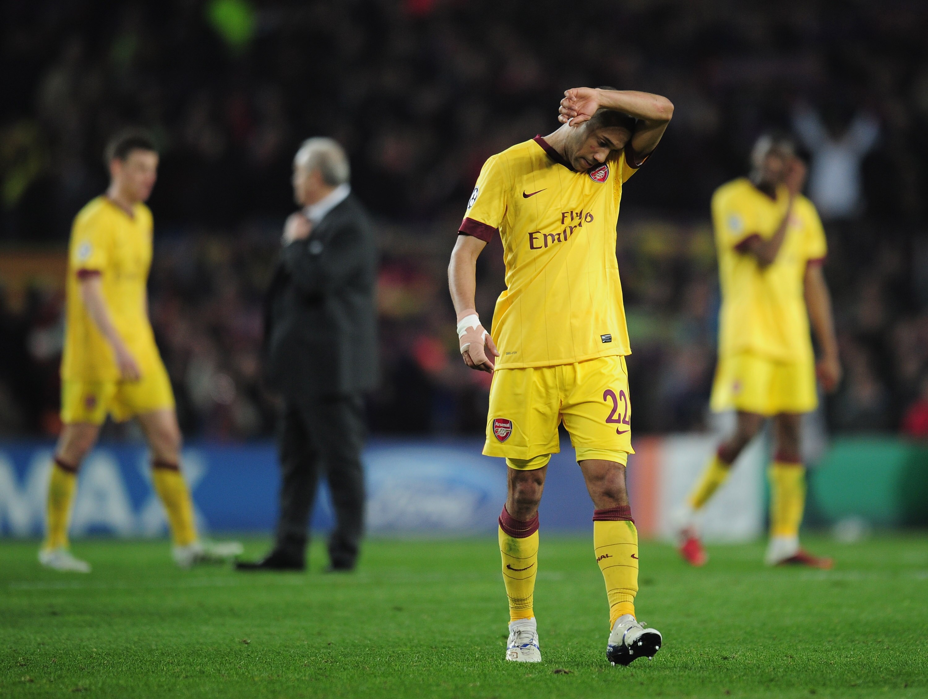BARCELONA, SPAIN - MARCH 08: Gael Clichy of Arsenal leaves the field at the end of the UEFA Champions League round of 16 second leg match between Barcelona and Arsenal at the Nou Camp Stadium on March 8, 2011 in Barcelona, Spain. (Photo by Shaun Botteri BARCELONA, SPAIN - MARCH 08: Gael Clichy of Arsenal leaves the field at the end of the UEFA Champions League round of 16 second leg match between Barcelona and Arsenal at the Nou Camp Stadium on March 8, 2011 in Barcelona, Spain. (Photo by Shaun Botteri