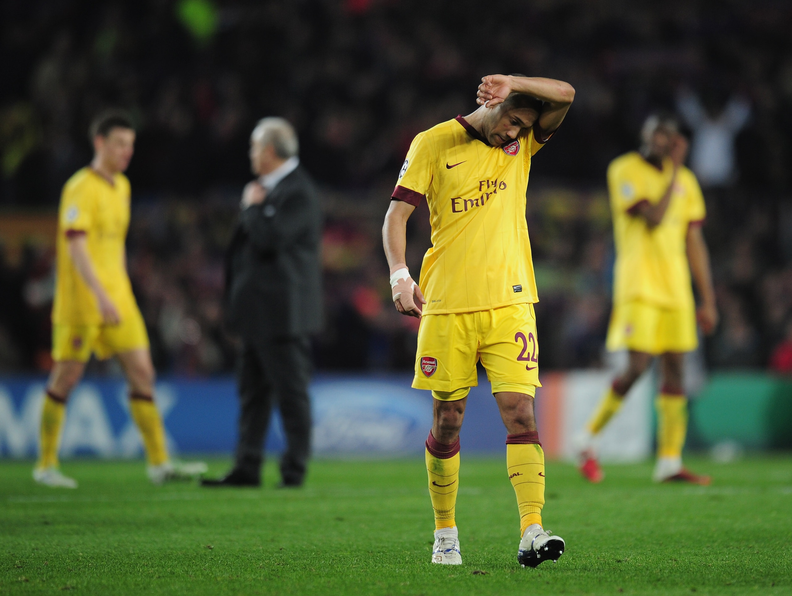 BARCELONA, SPAIN - MARCH 08:  Gael Clichy of Arsenal leaves the field at the end of the UEFA Champions League round of 16 second leg match between Barcelona and Arsenal at the Nou Camp Stadium on March 8, 2011 in Barcelona, Spain.  (Photo by Shaun Botteri