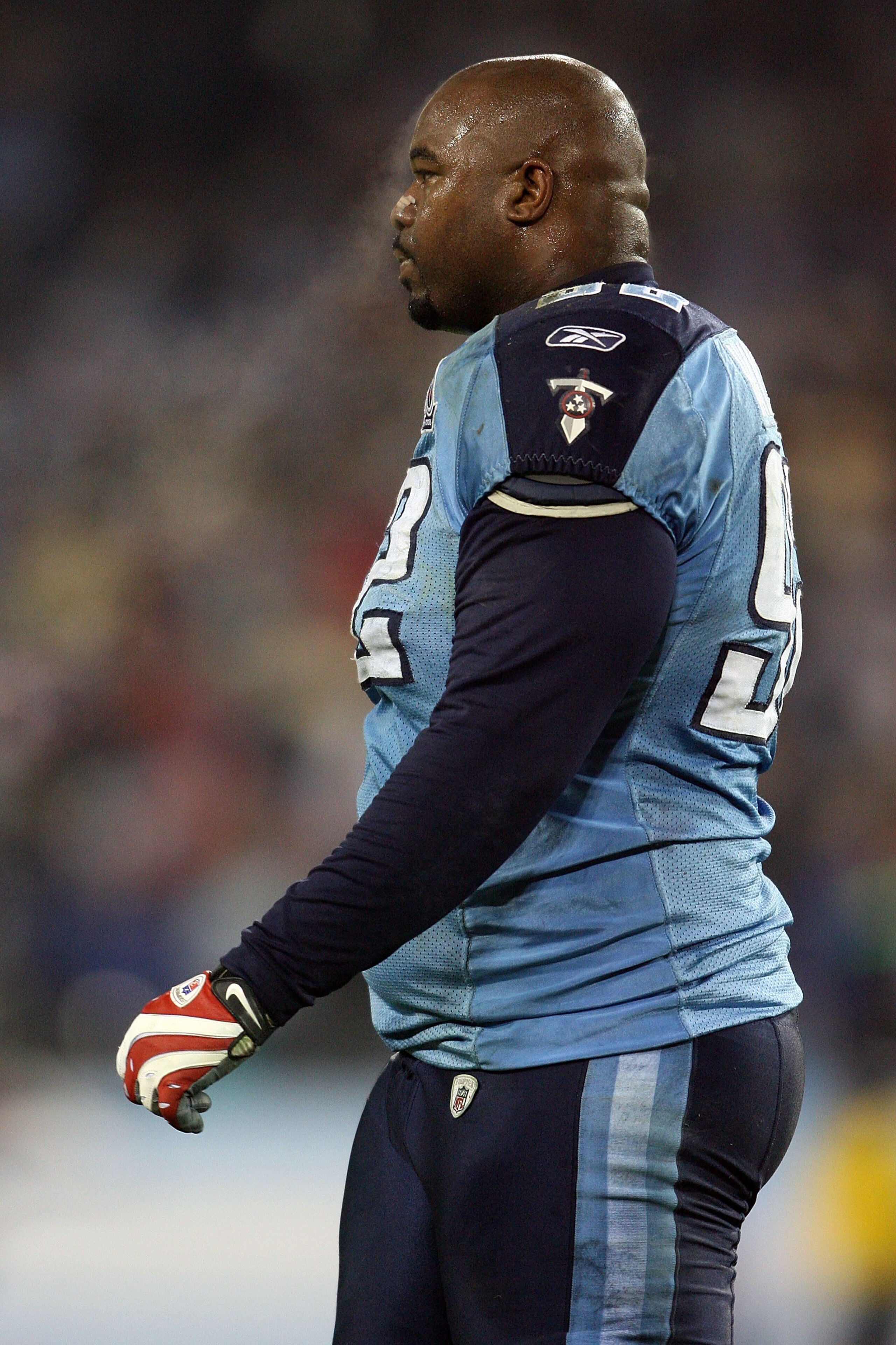 NASHVILLE, TN - JANUARY 10:  Defensive tackle Albert Haynesworth #92 of the Tennessee Titans looks on after losing to the Baltimore Ravens 13-10 during the AFC Divisional Playoff Game on January 10, 2009 at LP Field in Nashville, Tennessee.  (Photo by And