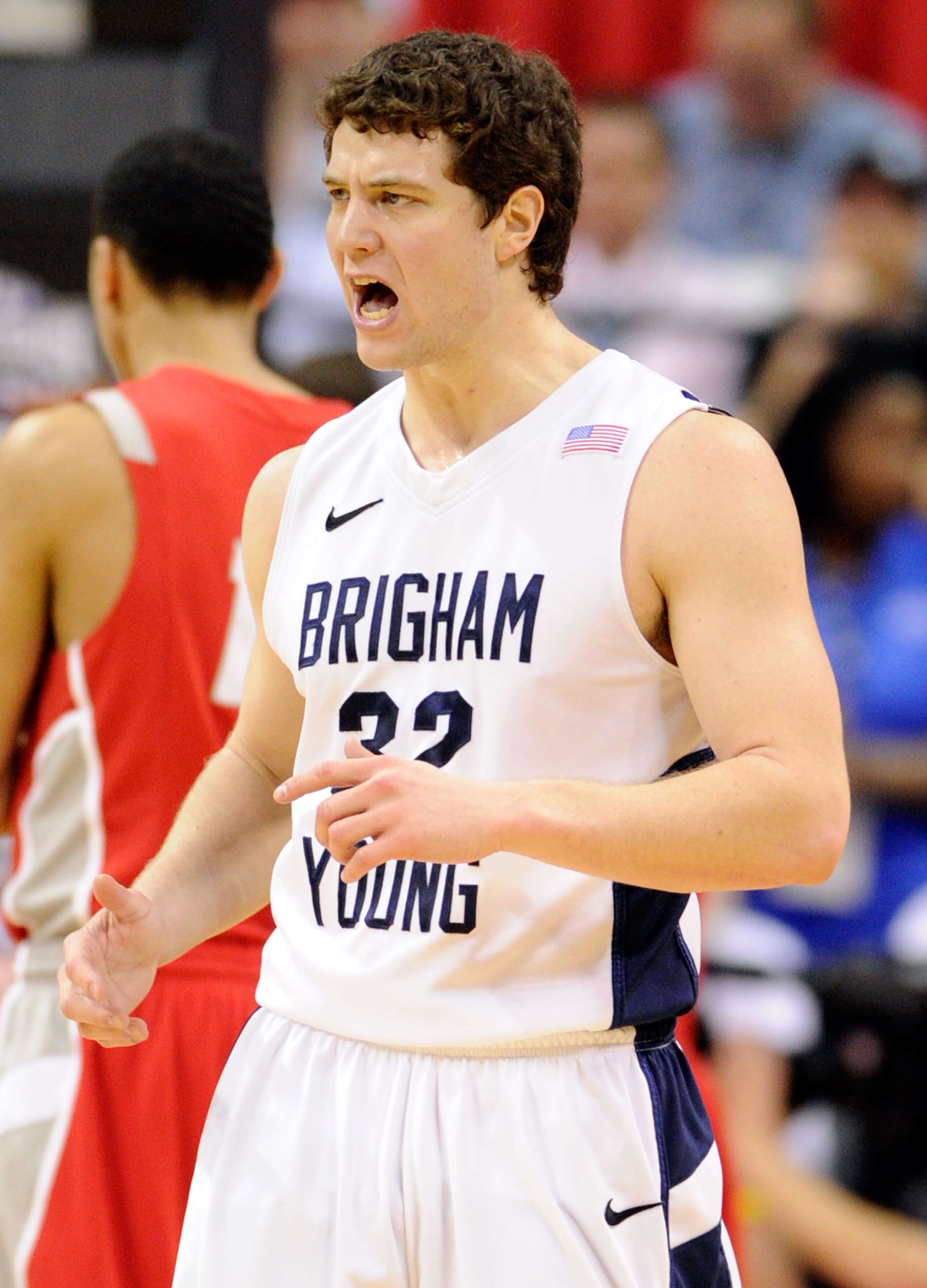 LAS VEGAS, NV - MARCH 11:  Jimmer Fredette #32 of the Brigham Young University Cougars reacts during a semifinal game of the Conoco Mountain West Conference Basketball tournament against he New Mexico Lobos at the Thomas & Mack Center March 11, 2011 in La