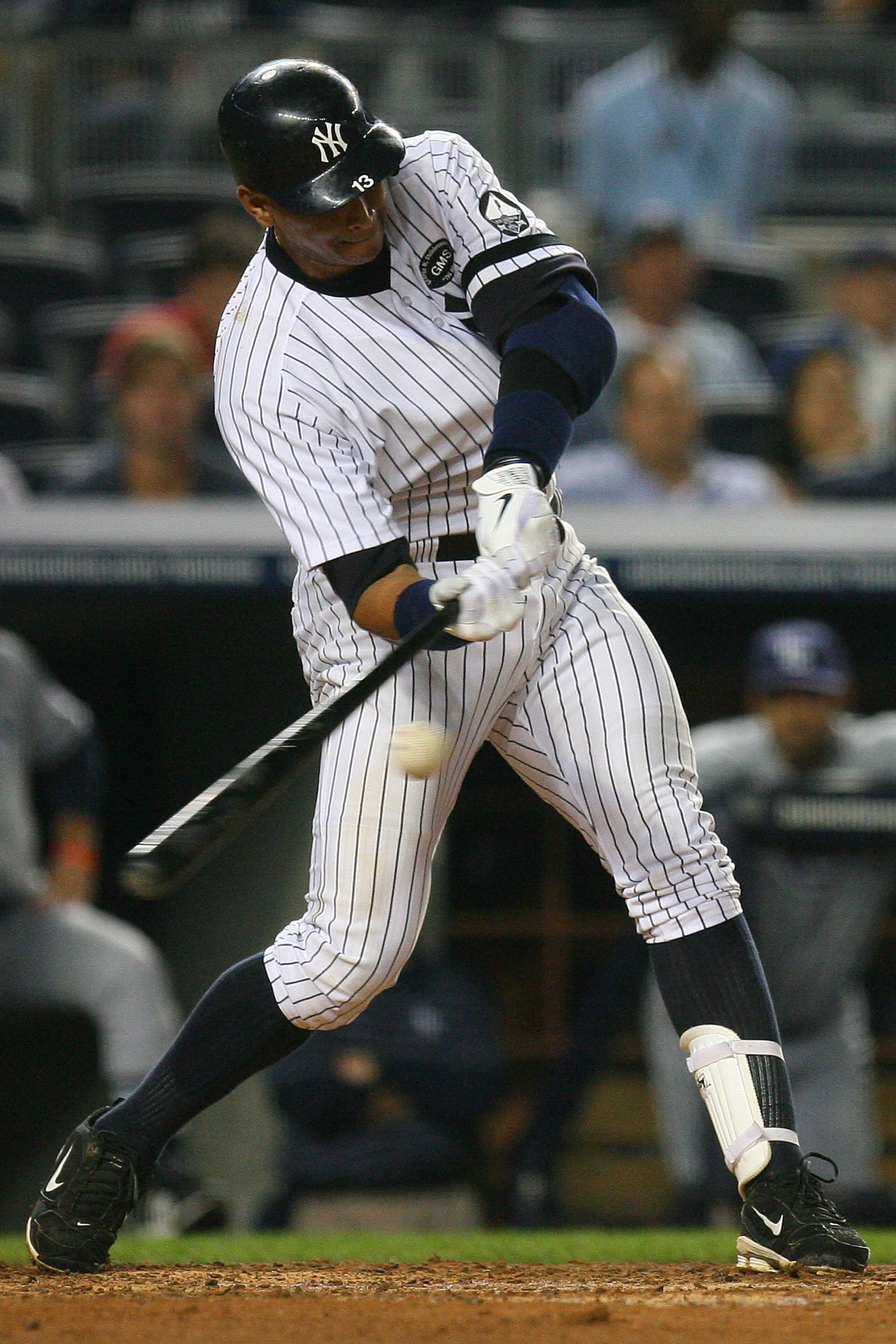 NEW YORK - SEPTEMBER 22: Alex Rodriguez #13 of the New York Yankees bats against the Tampa Bay Rays on September 22, 2010 at Yankee Stadium in the Bronx borough of New York City. (Photo by Andrew Burton/Getty Images) NEW YORK - SEPTEMBER 22: Alex Rodriguez #13 of the New York Yankees bats against the Tampa Bay Rays on September 22, 2010 at Yankee Stadium in the Bronx borough of New York City. (Photo by Andrew Burton/Getty Images)