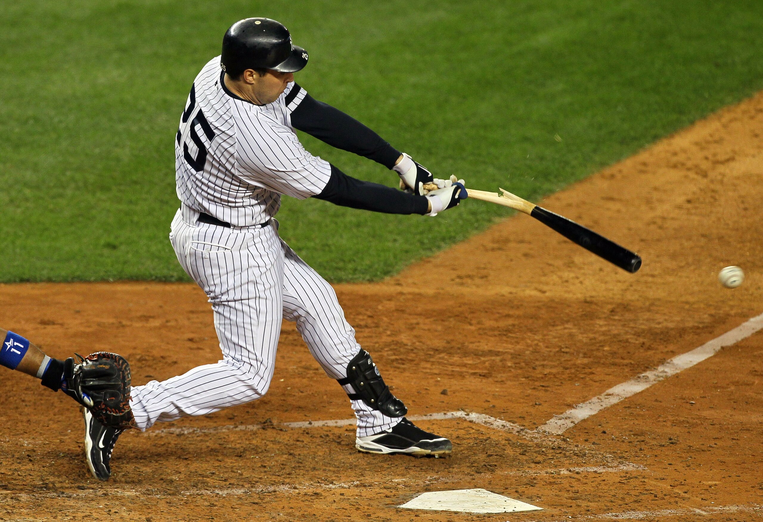 NEW YORK - OCTOBER 18: Mark Teixeira #25 of the New York Yankees hits a broken bat ground out to the shortstop in the bottom of the sixth inning against the Texas Rangers in Game Three of the ALCS during the 2010 MLB Playoffs at Yankee Stadium on October NEW YORK - OCTOBER 18: Mark Teixeira #25 of the New York Yankees hits a broken bat ground out to the shortstop in the bottom of the sixth inning against the Texas Rangers in Game Three of the ALCS during the 2010 MLB Playoffs at Yankee Stadium on October