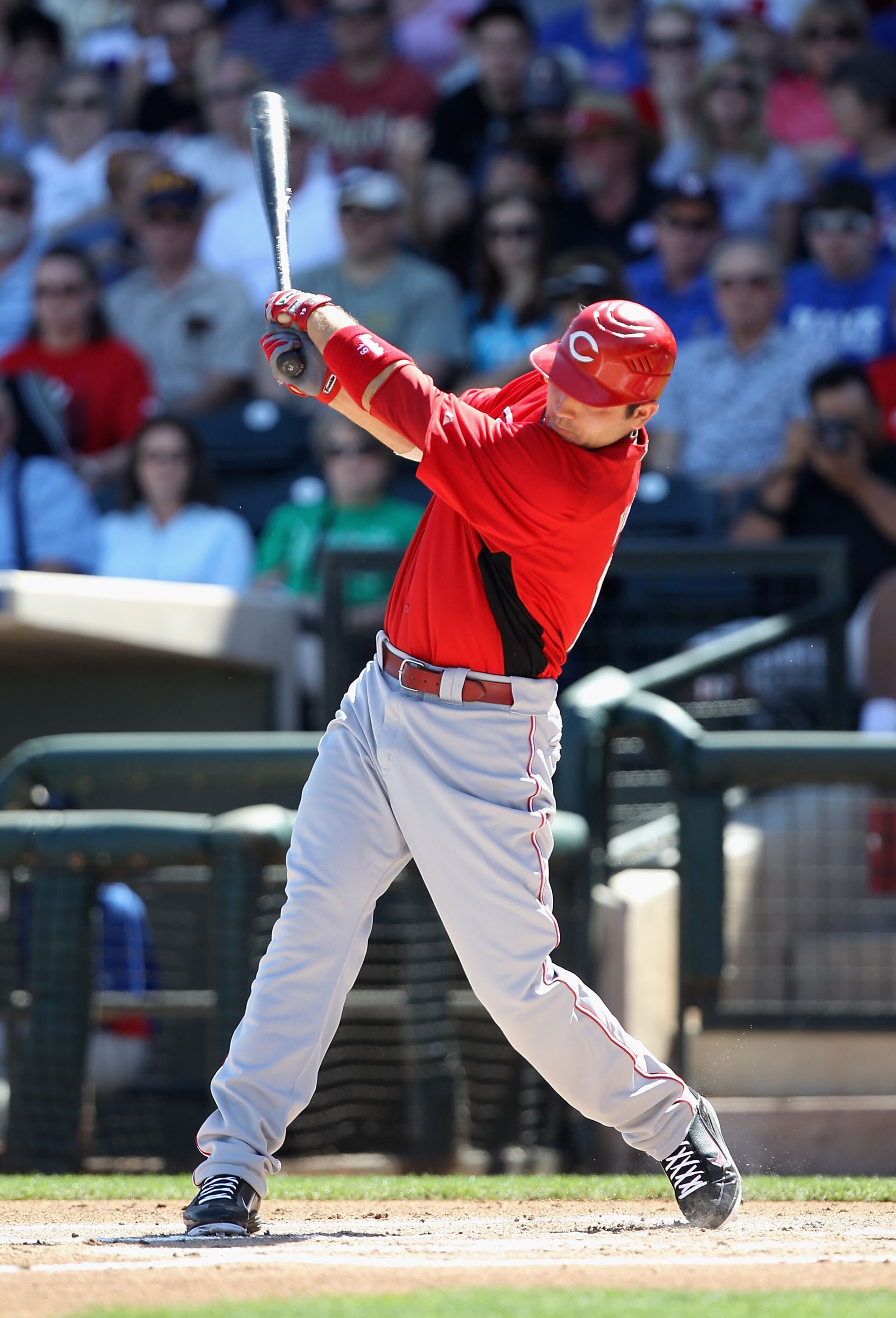 SURPRISE, AZ - MARCH 11: Joey Votto #19 of the Cincinnati Reds hits a RBI single during the first inning of the spring training game against the Texas Rangers at Surprise Stadium on March 11, 2011 in Surprise, Arizona. (Photo by Christian Petersen/Getty SURPRISE, AZ - MARCH 11: Joey Votto #19 of the Cincinnati Reds hits a RBI single during the first inning of the spring training game against the Texas Rangers at Surprise Stadium on March 11, 2011 in Surprise, Arizona. (Photo by Christian Petersen/Getty