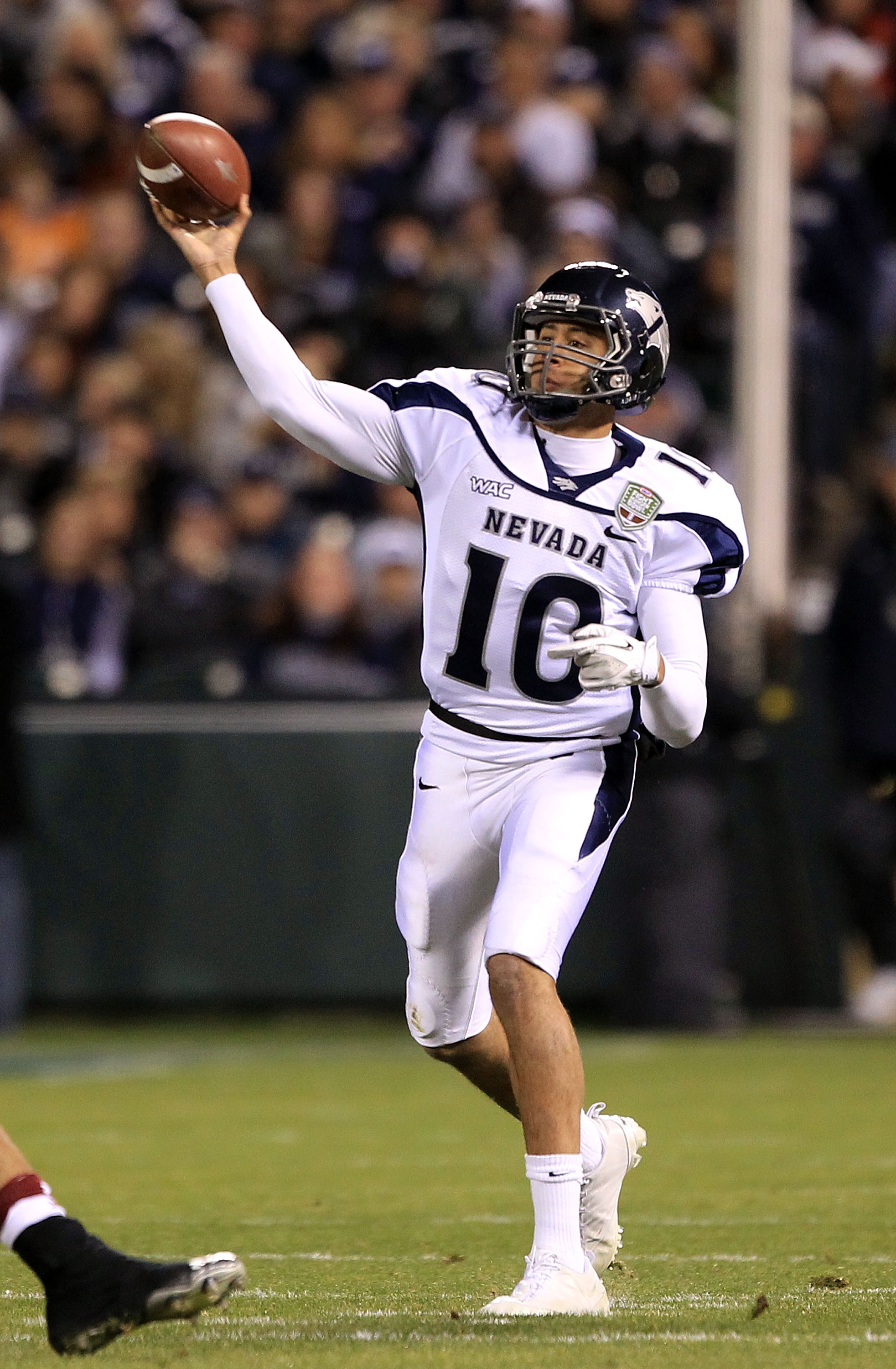 SAN FRANCISCO, CA - JANUARY 09: Colin Kaepernick #10 of the Nevada Wolf Pack throws the ball against Boston College during the Kraft Fight Hunger Bowl at AT&T Park on January 9, 2011 in San Francisco, California. (Photo by Ezra Shaw/Getty Images)
