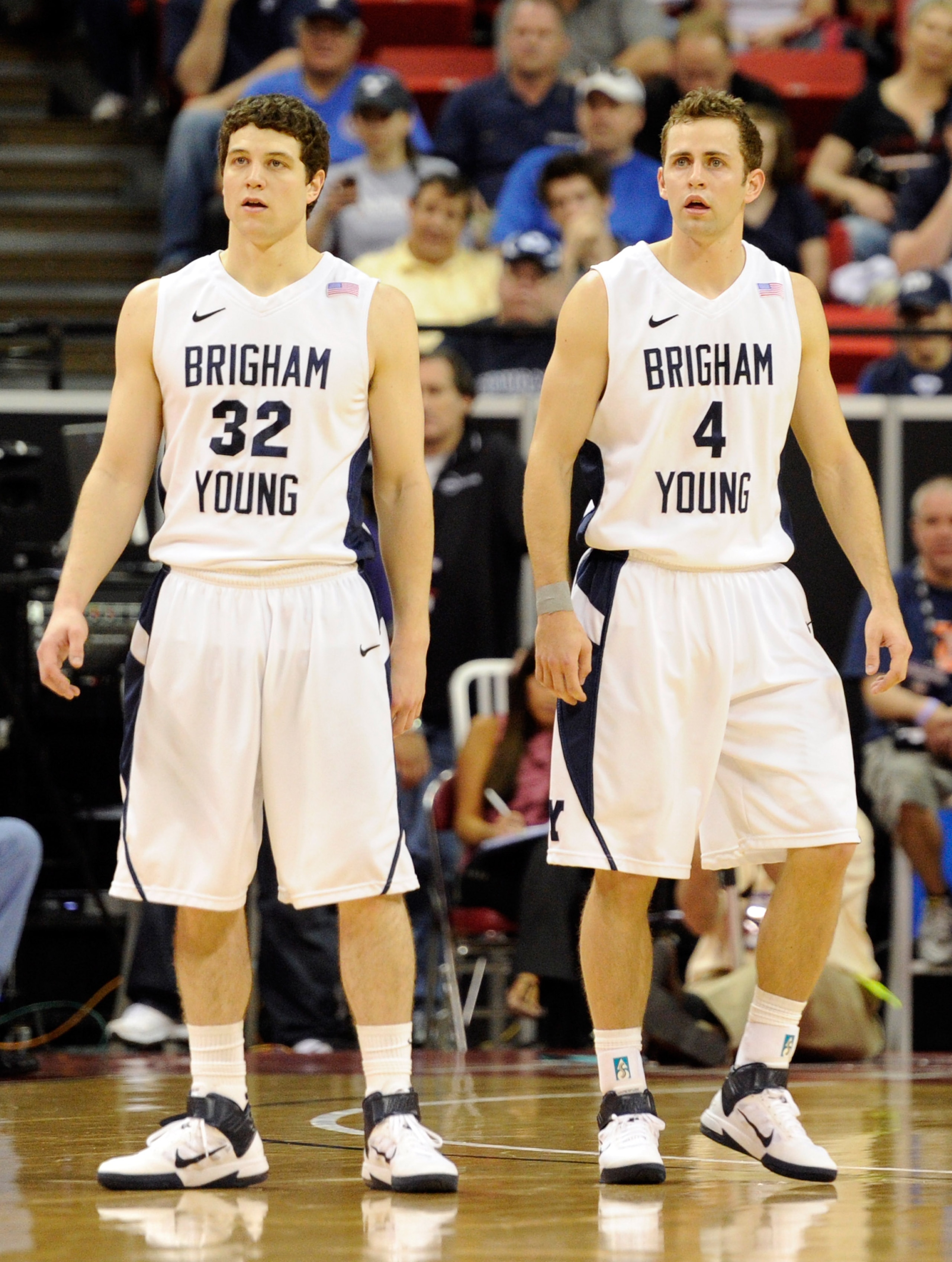 LAS VEGAS, NV - MARCH 10:  Jimmer Fredette #32 and Jackson Emery #4 of the Brigham Young University Cougars appear on the court during a quarterfinal game of the Conoco Mountain West Conference Basketball tournament against the Texas Christian University