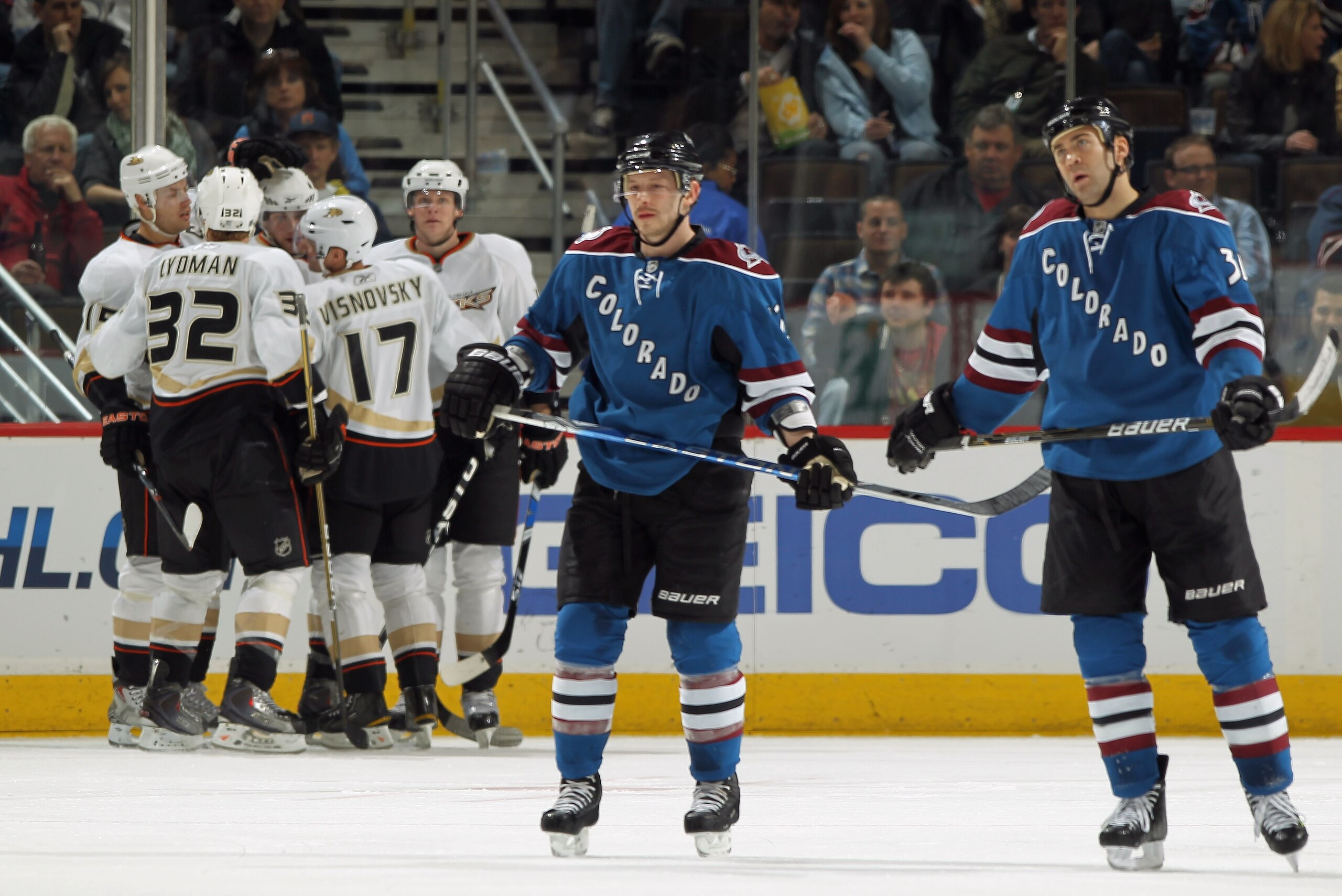 DENVER, CO - MARCH 11: Ryan Getzlaf #15, Toni Lydman #32 and Lubomir Visnovsky #17 celebrate a third period goal by teammate Bobby Ryan #9 of t he Anaheim Ducks as Kevin Porter #12 and David Winnik #34 of the Colorado Avalanche skate off the ice during N DENVER, CO - MARCH 11: Ryan Getzlaf #15, Toni Lydman #32 and Lubomir Visnovsky #17 celebrate a third period goal by teammate Bobby Ryan #9 of t he Anaheim Ducks as Kevin Porter #12 and David Winnik #34 of the Colorado Avalanche skate off the ice during N