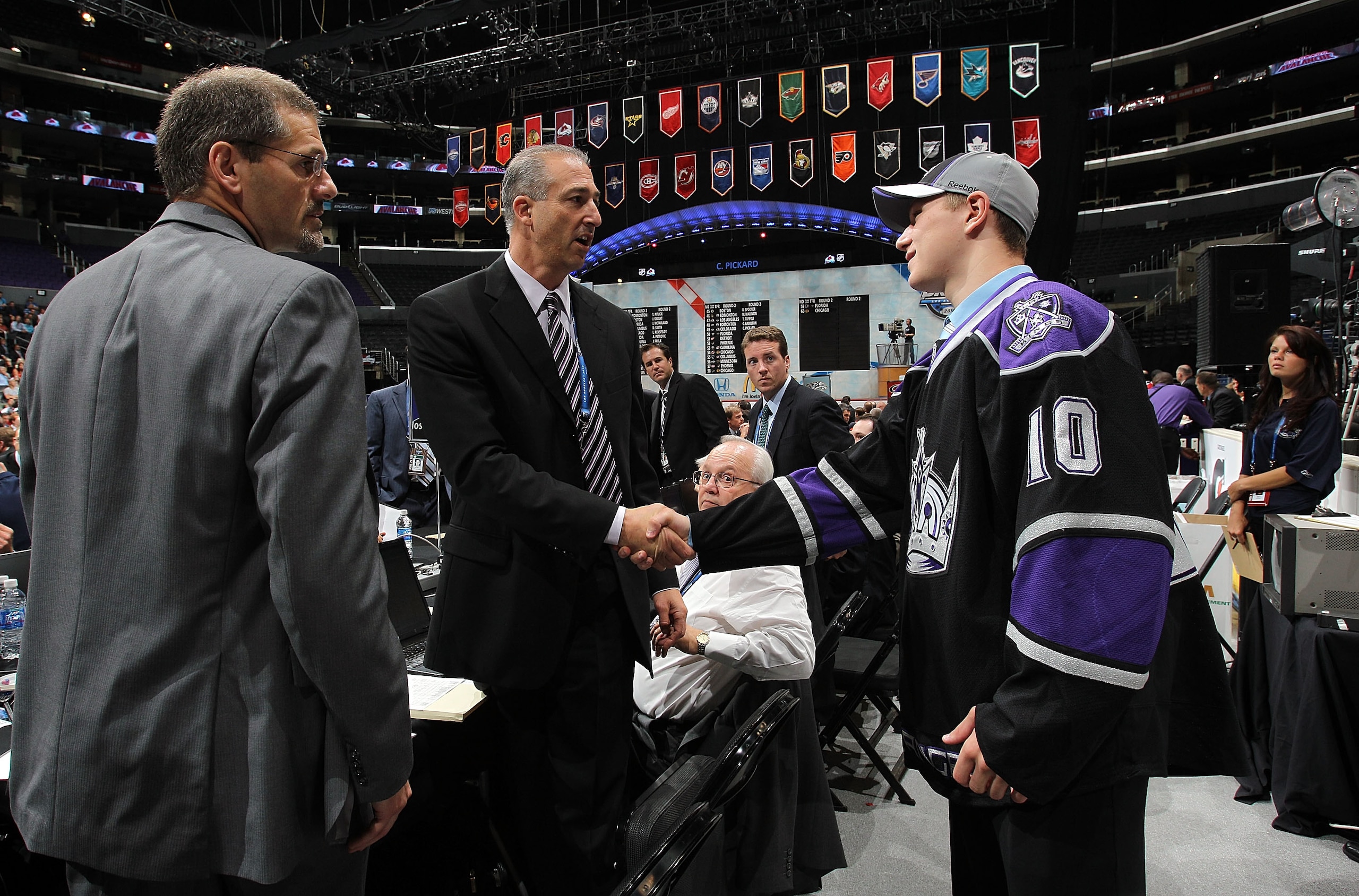 LOS ANGELES, CA - JUNE 26: Tyler Toffoli shakes hands with team personnel after being drafted in the second round by the Los Angeles Kings during day two of the 2010 NHL Entry Draft at Staples Center on June 26, 2010 in Los Angeles, California. (Photo b LOS ANGELES, CA - JUNE 26: Tyler Toffoli shakes hands with team personnel after being drafted in the second round by the Los Angeles Kings during day two of the 2010 NHL Entry Draft at Staples Center on June 26, 2010 in Los Angeles, California. (Photo b