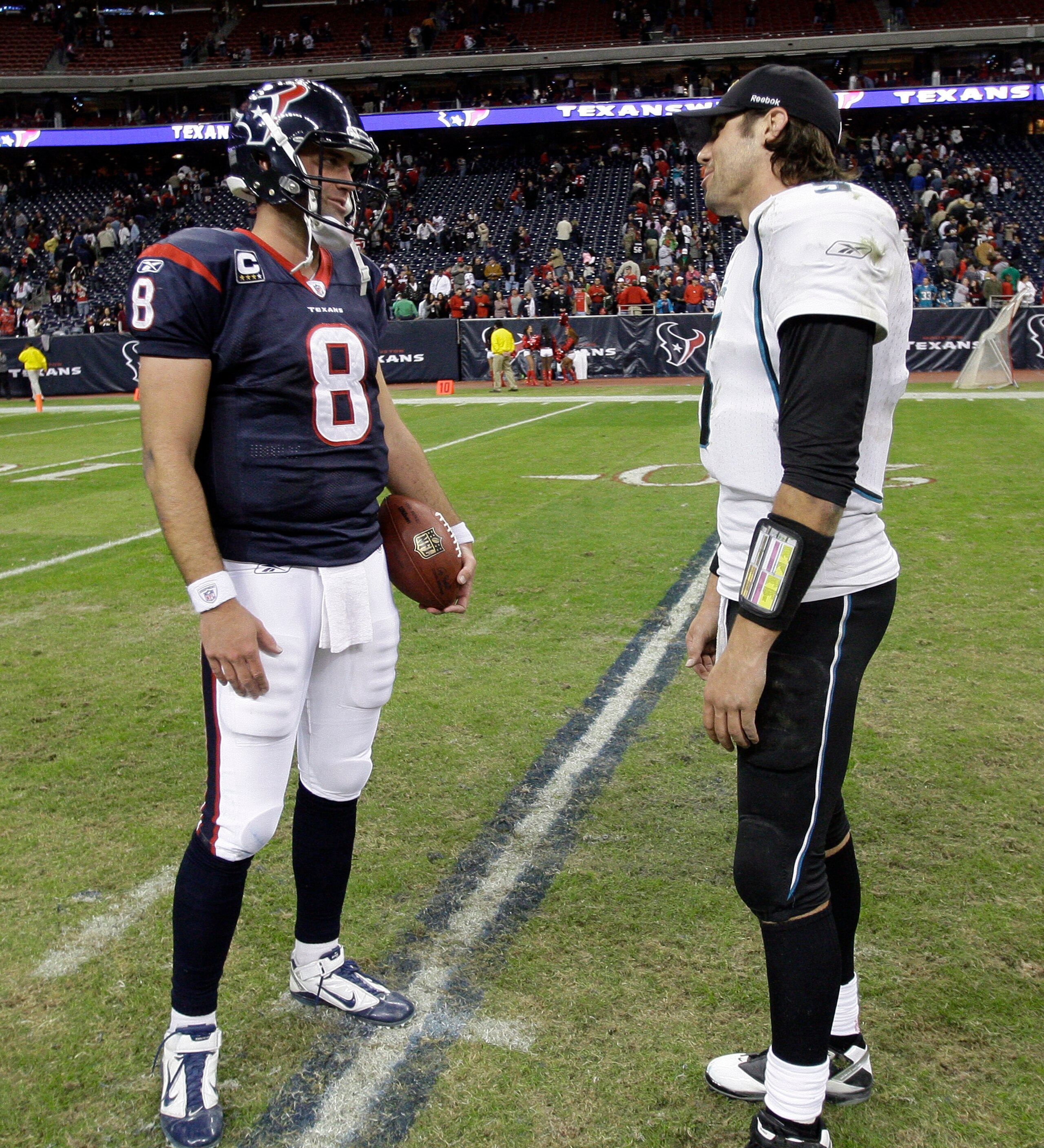 HOUSTON - JANUARY 02:  Quarerback Matt Schaub #8 of the Houston Texans and quarterback Trent Edwards of theJacksonville Jaguars tal after the game  at Reliant Stadium on January 2, 2011 in Houston, Texas.  (Photo by Bob Levey/Getty Images)