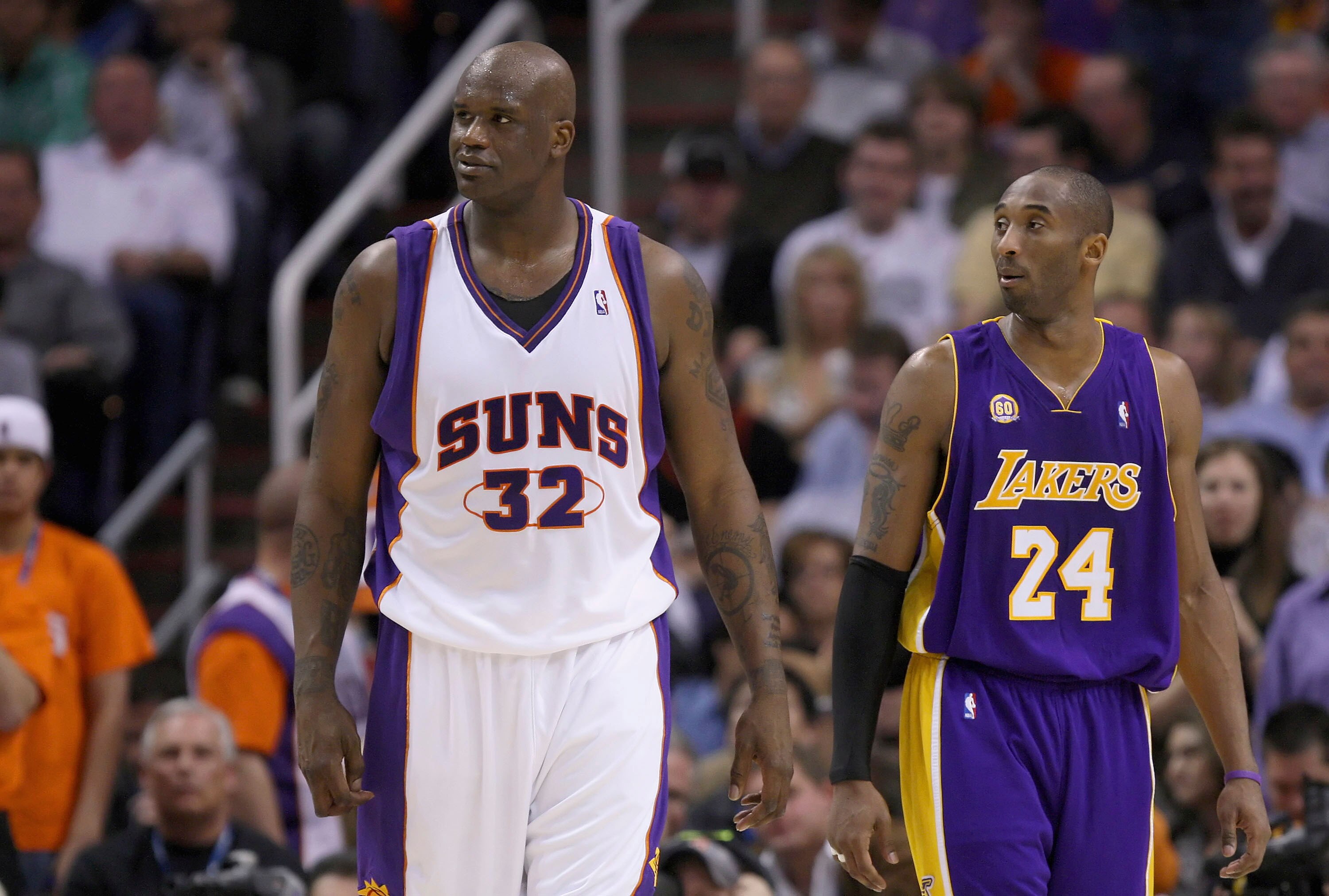 PHOENIX - FEBRUARY 20:   Shaquille O'Neal #32 of the Phoenix Suns and Kobe Bryant #24 of the Los Angeles Lakers talk during the game at US Airways Center on February 20, 2008 in Phoenix, Arizona.  NOTE TO USER: User expressly acknowledges and agrees that,