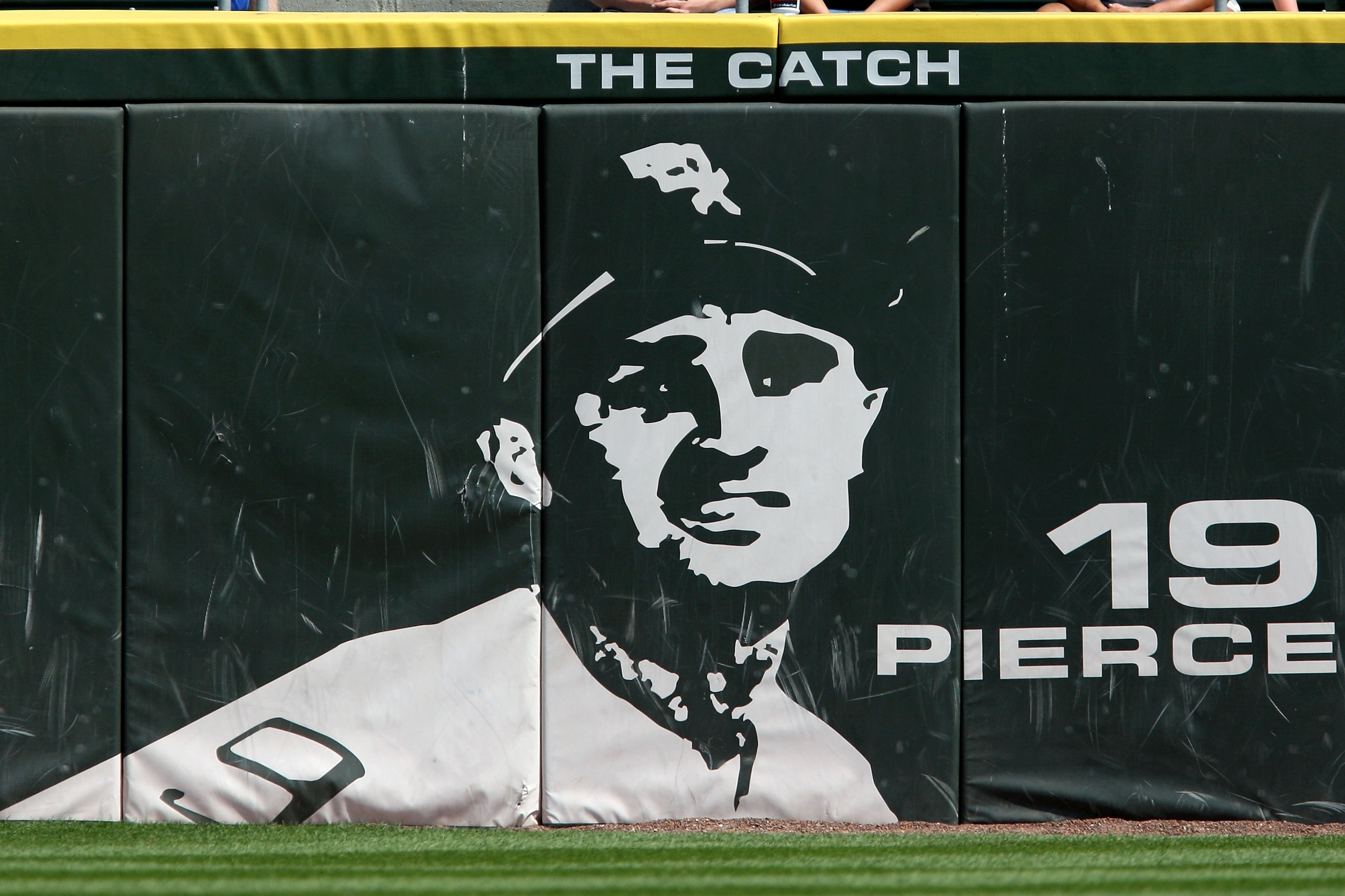 CHICAGO - AUGUST 06:  The words 'The Catch' are seen above the likeness of former Chicago White Sox player Billy Pierce #19 against the Los Angeles Angels of Anaheim at U.S. Cellular Field on August 6, 2009 in Chicago, Illinois. 'The Catch' referes to the