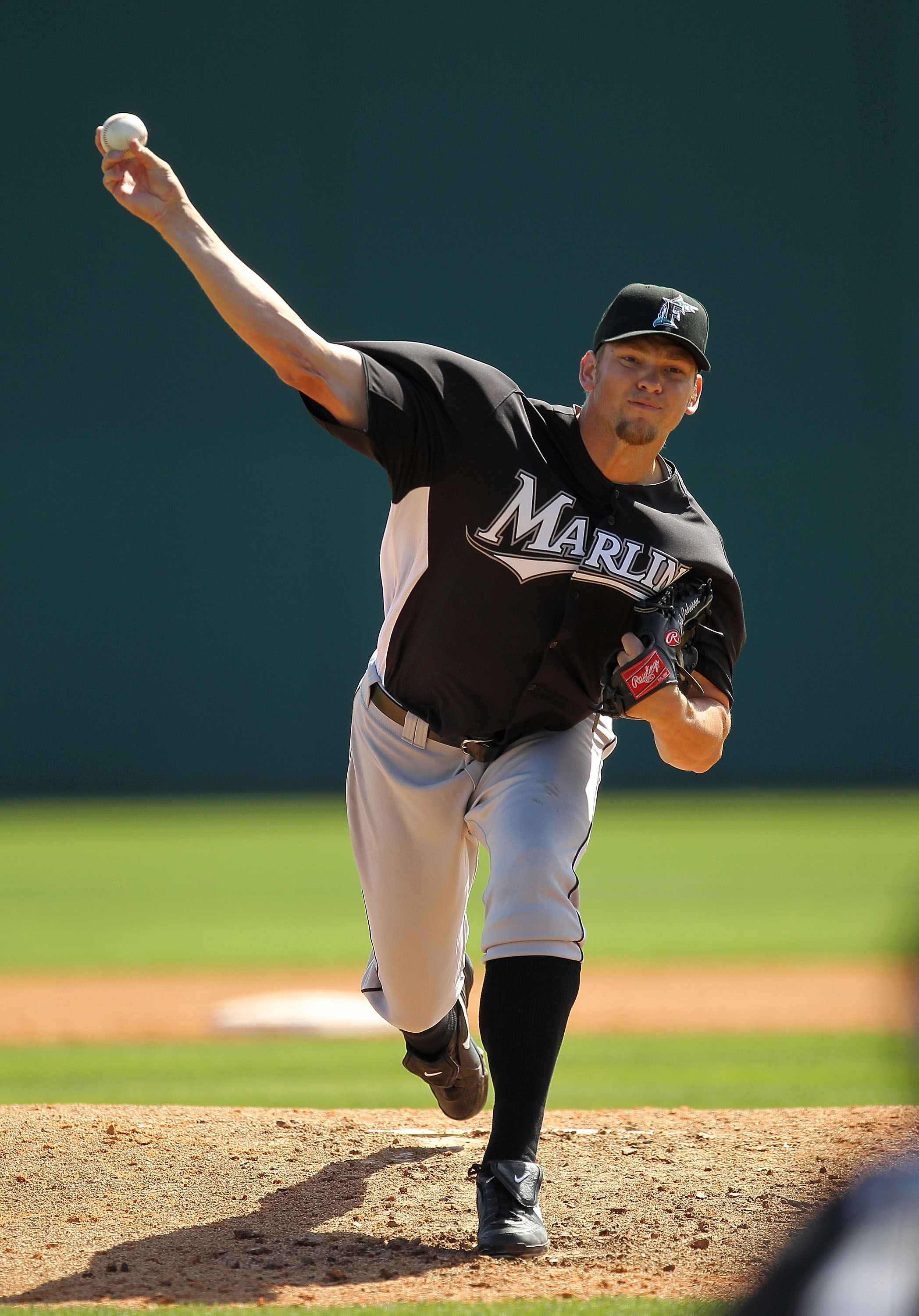 VIERA, FL - MARCH 02:  Josh Johnson #55  of the Florida Marlins pitches during a Spring Training game against the Washington Nationals at Space Coast Stadium on March 2, 2011 in Viera, Florida.  (Photo by Mike Ehrmann/Getty Images)