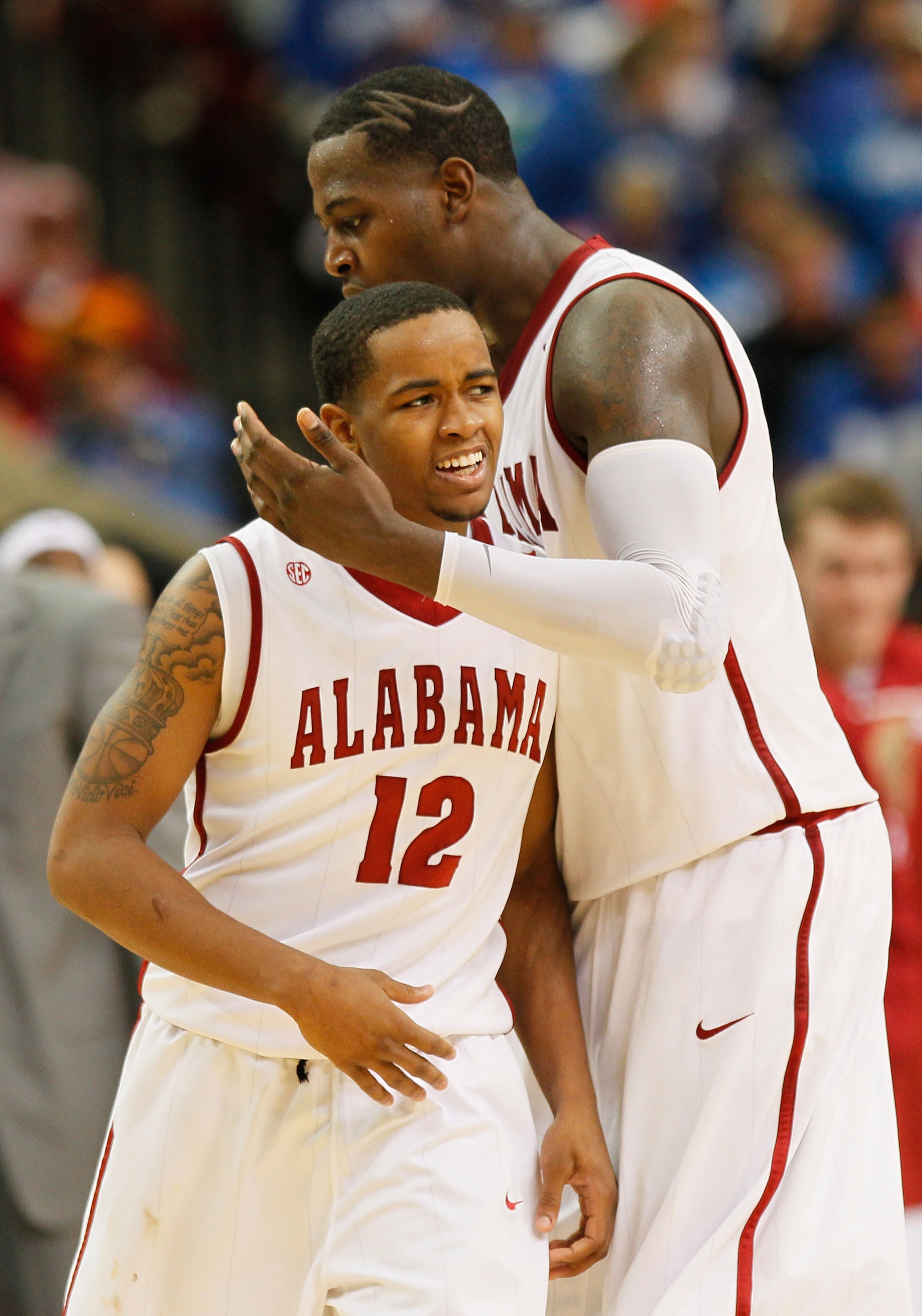 ATLANTA, GA - MARCH 11:  JaMychal Green #1 and Trevor Releford #12 of the Alabama Crimson Tide celebrate after drawing a foul during the quarterfinals of the SEC Men's Basketball Tournament at Georgia Dome on March 11, 2011 in Atlanta, Georgia.  (Photo by
