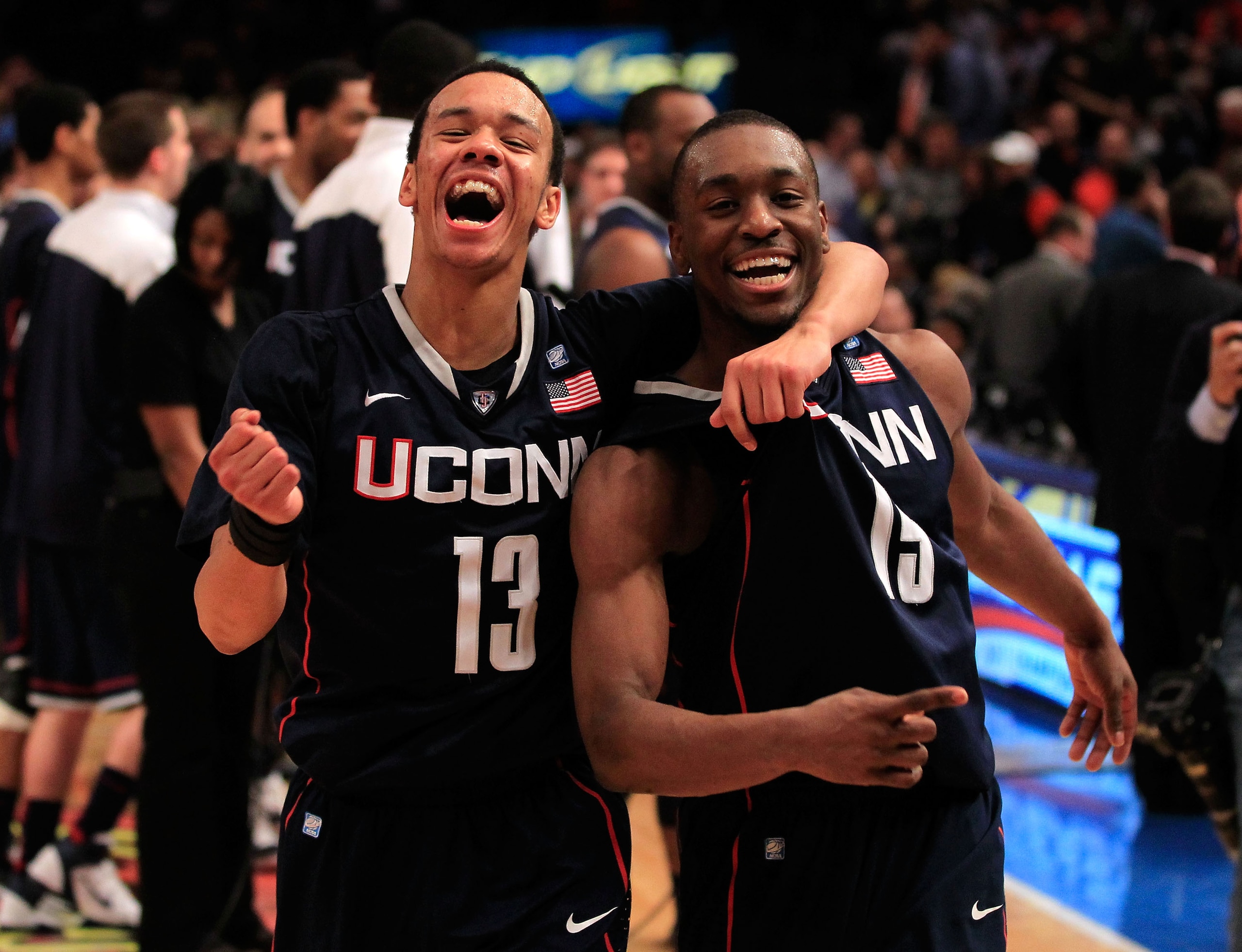 NEW YORK, NY - MARCH 10:  Shabazz Napier #13 and Kemba Walker #15 of the Connecticut Huskies celebrate after defeating the Pittsburgh Panthers during the quarterfinals of the 2011 Big East Men's Basketball Tournament presented by American Eagle Outfitters