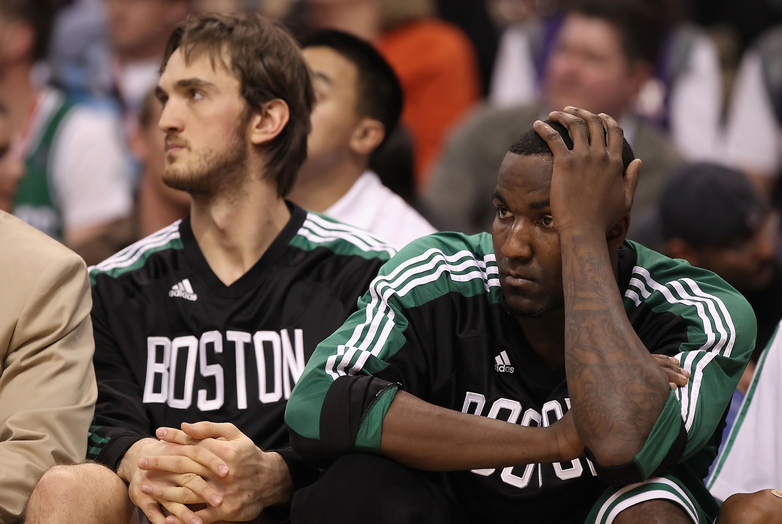 PHOENIX, AZ - JANUARY 28:  Kendrick Perkins #43  of the Boston Celtics reacts while sitting on the bench during the NBA game against the Phoenix Suns at US Airways Center on January 28, 2011 in Phoenix, Arizona. The Suns defeated the Celtics 88-71.  NOTE