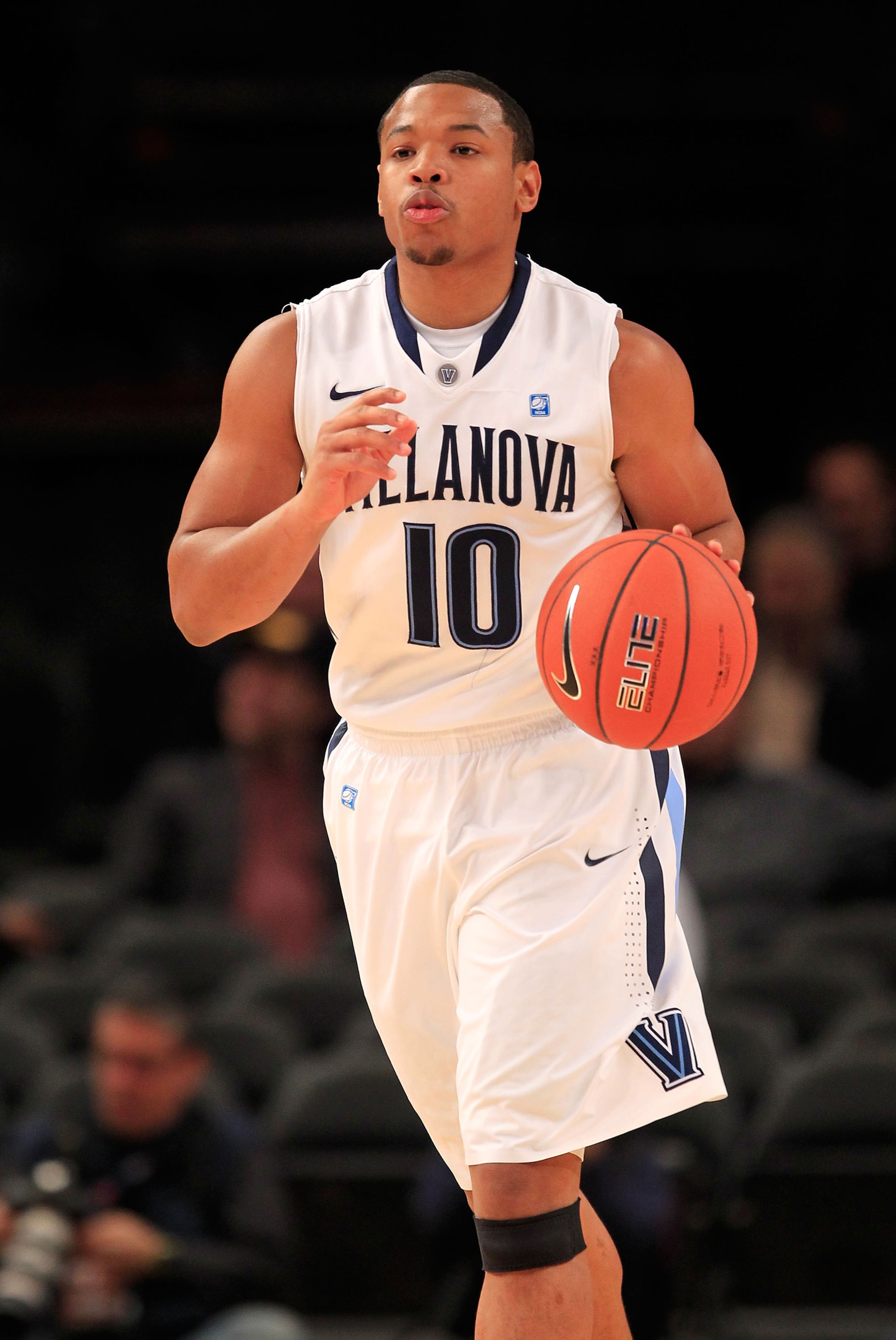 NEW YORK, NY - MARCH 08: Corey Fisher #10 of the Villanova Wildcats brings the ball up court against the South Florida Bulls during the first round of the 2011 Big East Men's Basketball Tournament presented by American Eagle Outfitters at Madison Square G