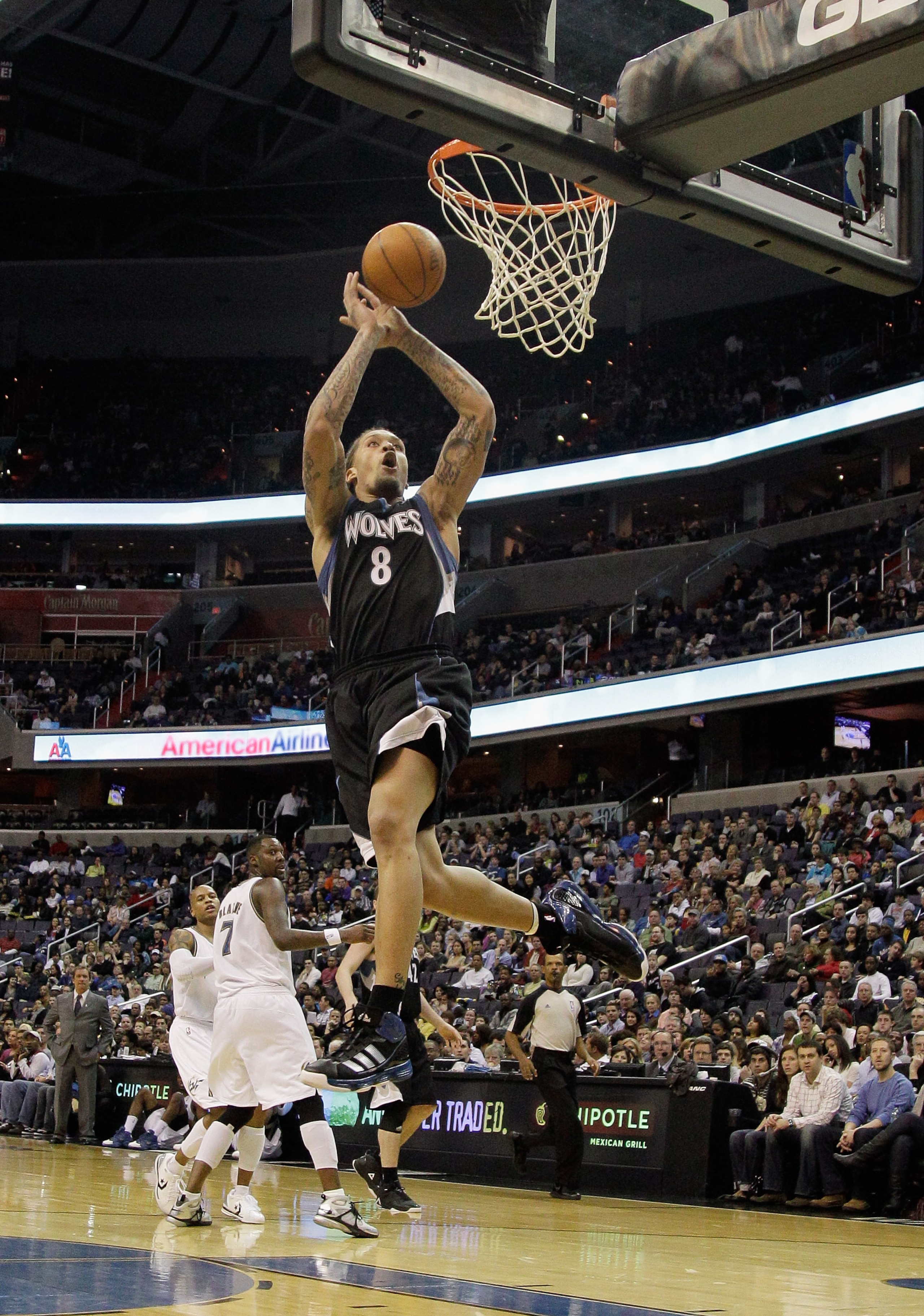 WASHINGTON, DC - MARCH 05:  Michael Beasley #8 of the Minnesota Timberwolves dunks against the Washington Wizards at the Verizon Center on March 5, 2011 in Washington, DC. NOTE TO USER: User expressly acknowledges and agrees that, by downloading and/or us