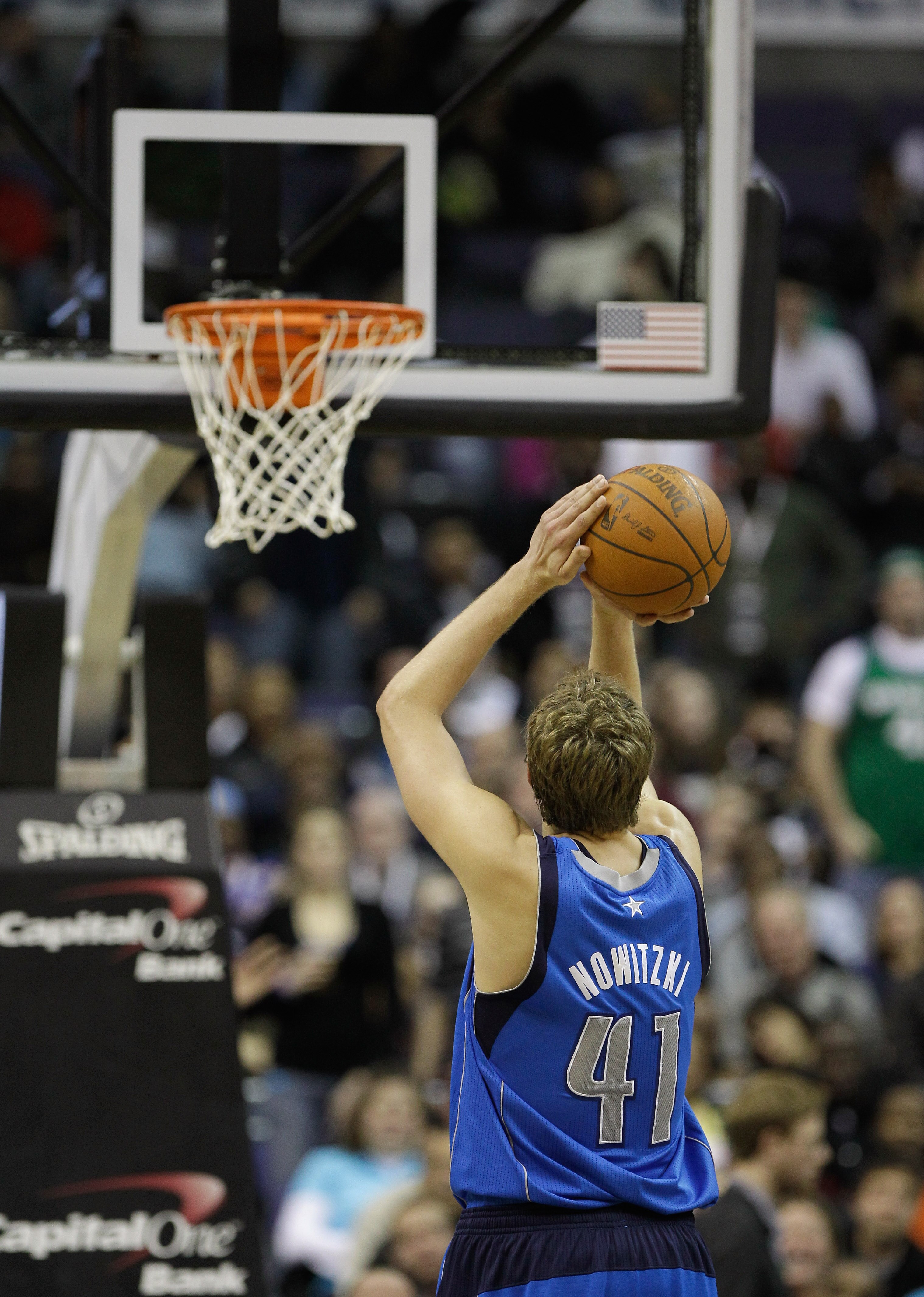 WASHINGTON, DC - FEBRUARY 26: Dirk Nowitzki #41 of the Dallas Mavericks shoots a free throw against the Washington Wizards at the Verizon Center on February 26, 2011 in Washington, DC. NOTE TO USER: User expressly acknowledges and agrees that, by download