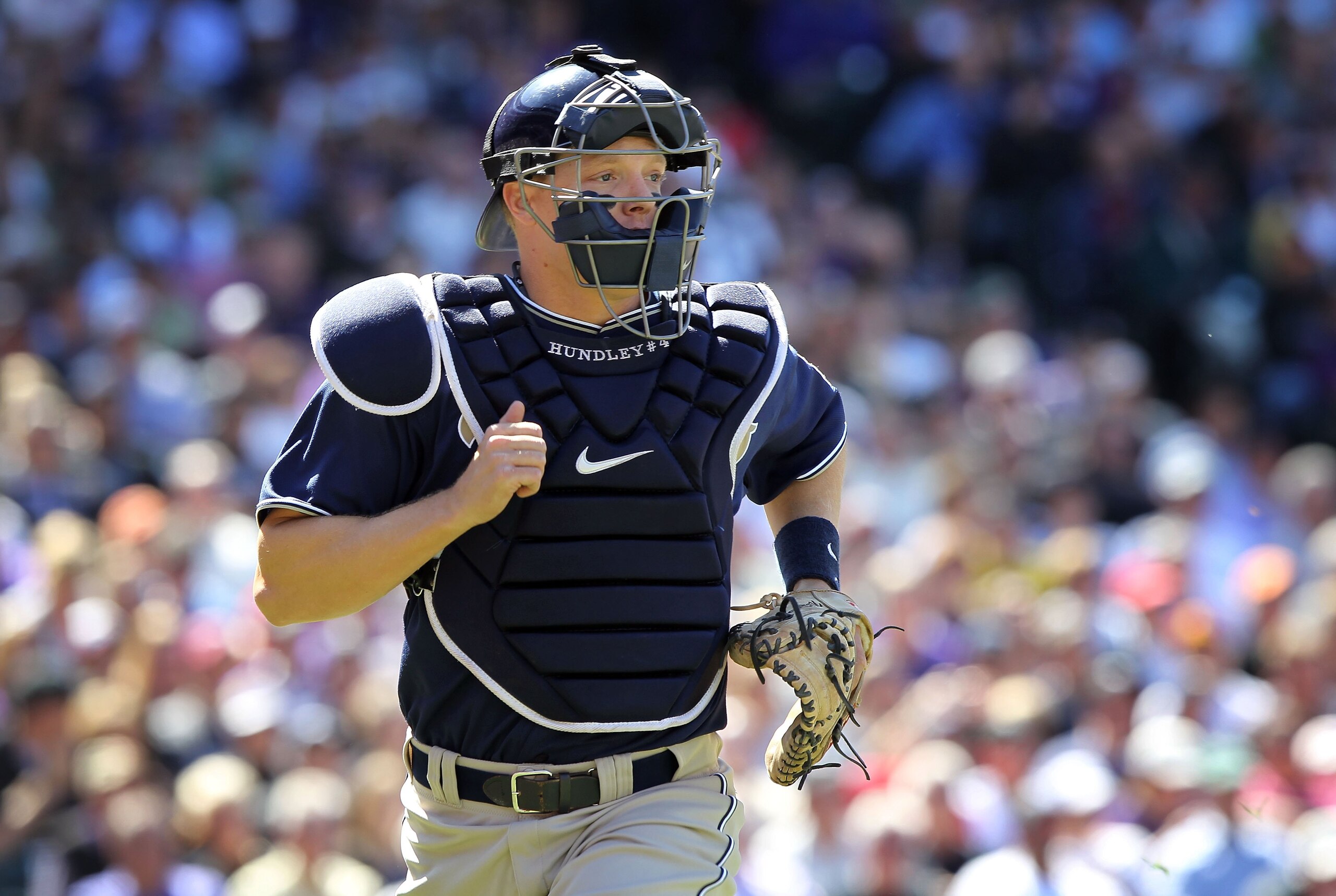 DENVER - APRIL 09: Catcher Nick Hundley #4 of the San Diego Padres heads to firstbase to back up a play against the Colorado Rockies during MLB action on Opening Day at Coors Field on April 9, 2010 in Denver, Colorado. The Rockies defeated the Padres 7-0 DENVER - APRIL 09: Catcher Nick Hundley #4 of the San Diego Padres heads to firstbase to back up a play against the Colorado Rockies during MLB action on Opening Day at Coors Field on April 9, 2010 in Denver, Colorado. The Rockies defeated the Padres 7-0