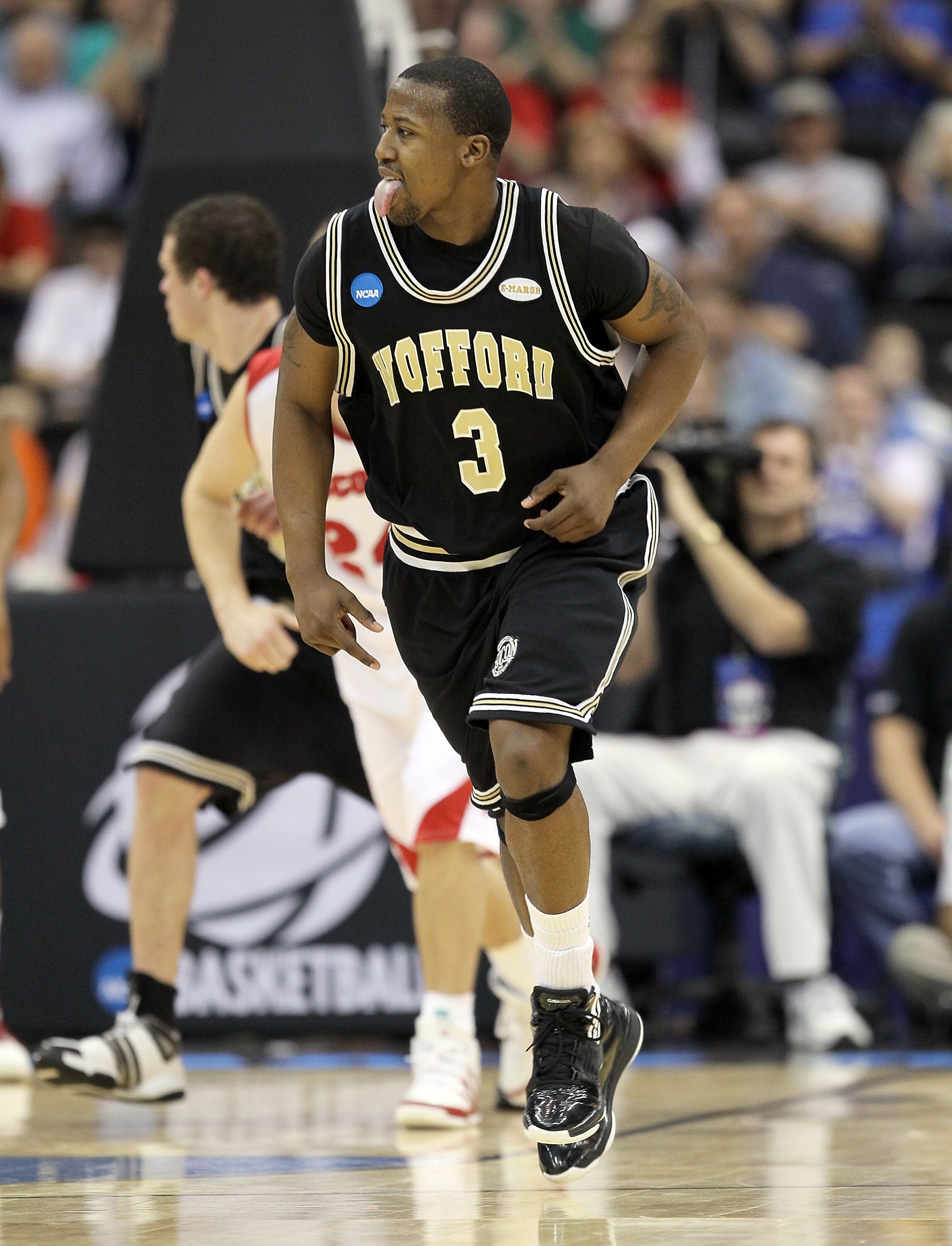 JACKSONVILLE, FL - MARCH 19:  Junior Salters #3 of the Wofford Terriers celebrates during the game against the Wisconsin Badgers in the first round of the 2010 NCAA men's basketball tournament at Jacksonville Veteran's Memorial Arena on March 19, 2010 in