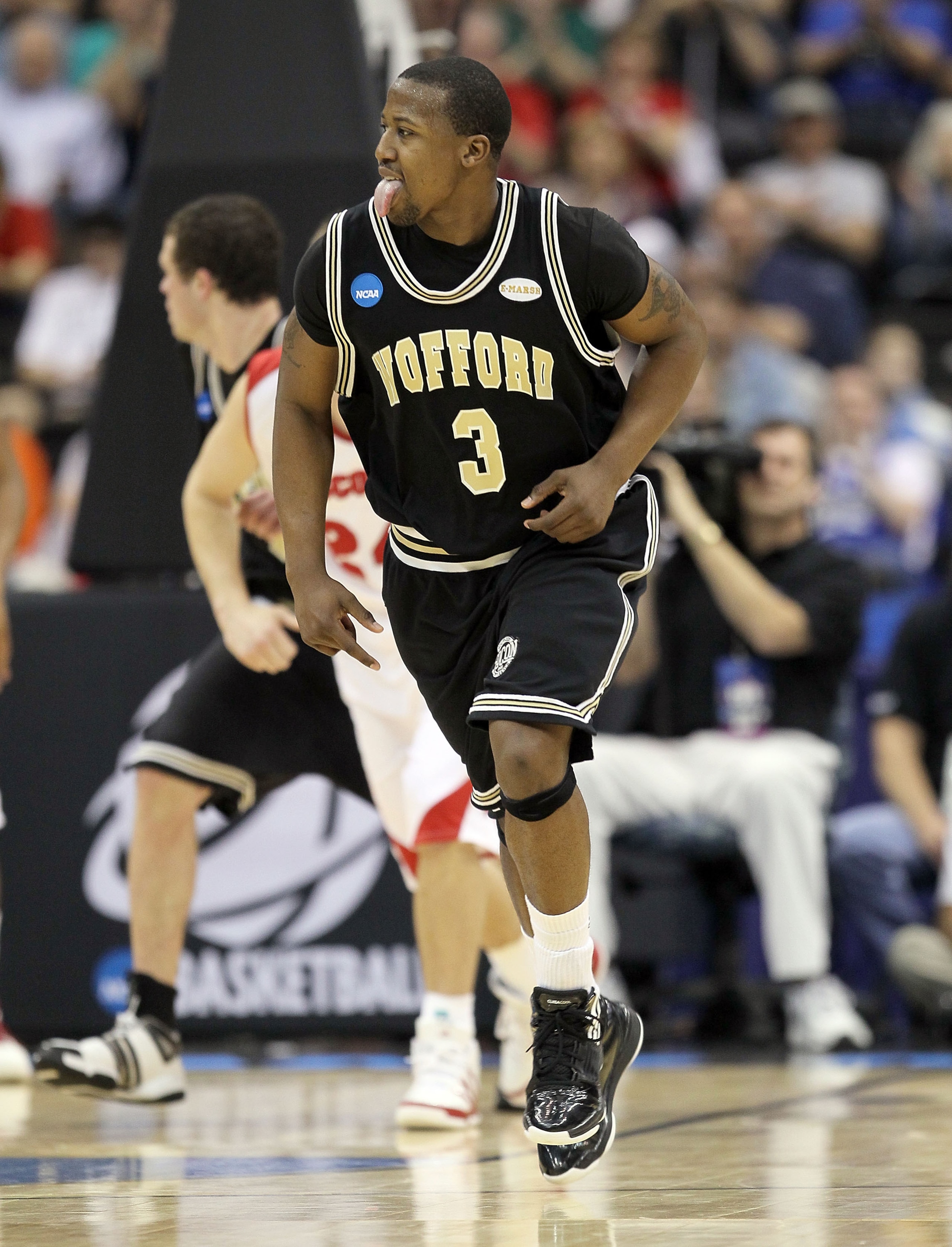 JACKSONVILLE, FL - MARCH 19:  Junior Salters #3 of the Wofford Terriers celebrates during the game against the Wisconsin Badgers in the first round of the 2010 NCAA men's basketball tournament at Jacksonville Veteran's Memorial Arena on March 19, 2010 in