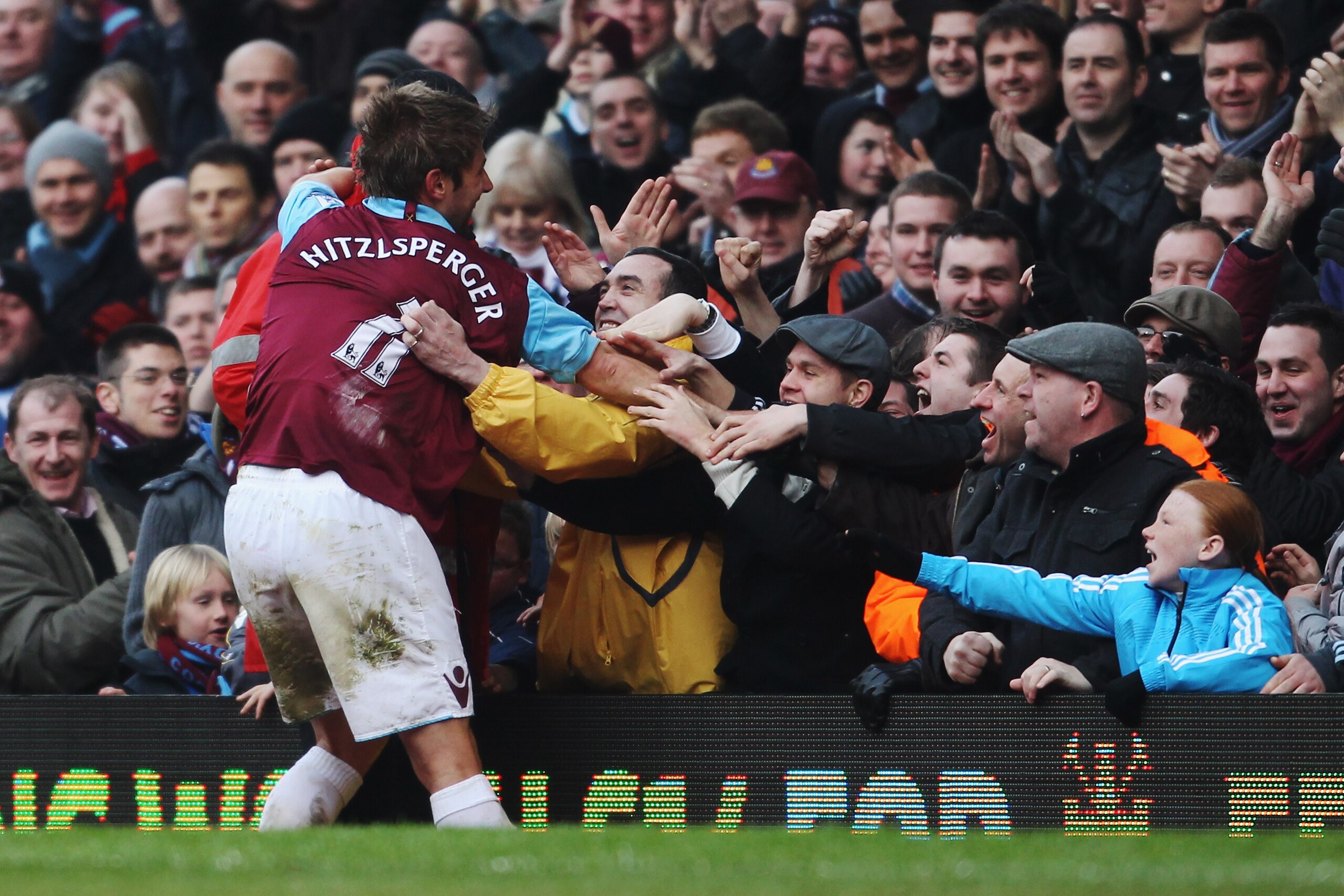 LONDON, UNITED KINGDOM - MARCH 05:  Thomas Hitzlsperger of West Ham United celebrates with the crowd after scoring his sides third goal during the Barclays Premier League match between West Ham United and Stoke City at the Boleyn Ground on March 5, 2011 i