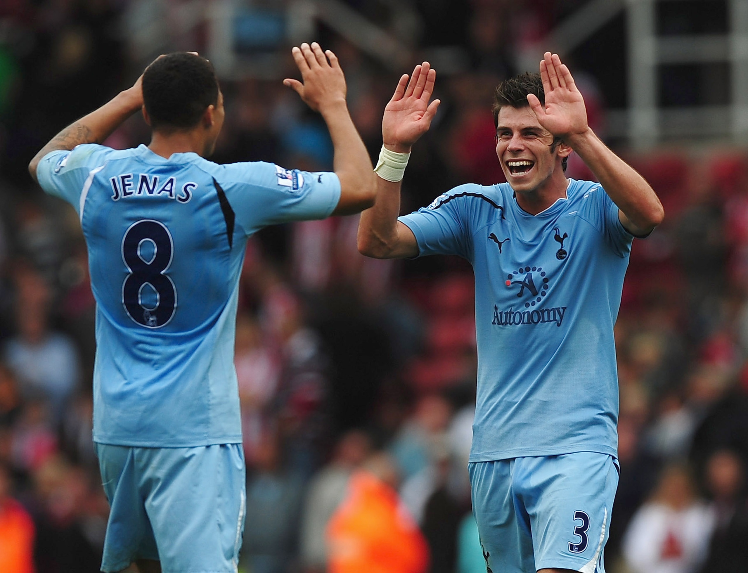 STOKE ON TRENT, ENGLAND - AUGUST 21:  Gareth Bale of Tottenham celebrates with Jermaine Jenas during the Barclays Premier League match between Stoke City and Tottenham Hotspur at the Britannia Stadium on August 21, 2010 in Stoke on Trent, England.  (Photo