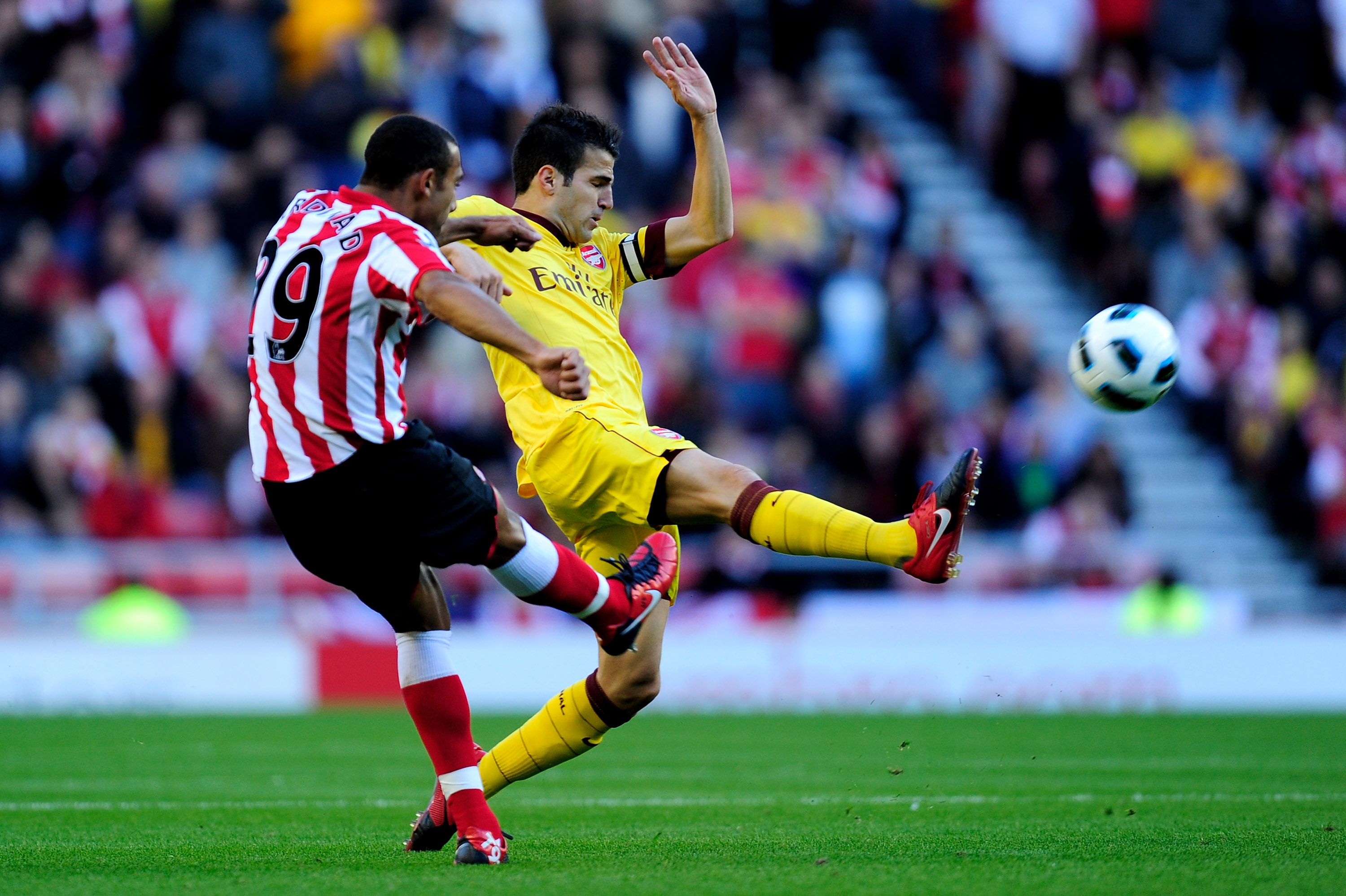 SUNDERLAND, ENGLAND - SEPTEMBER 18: Cesc Fabregas of Arsenal scores the opening goal during the Barclays Premier League match between Sunderland and Arsenal at the Stadium of Light on September 18, 2010 in Sunderland, England. (Photo by Jamie McDonald/Get
