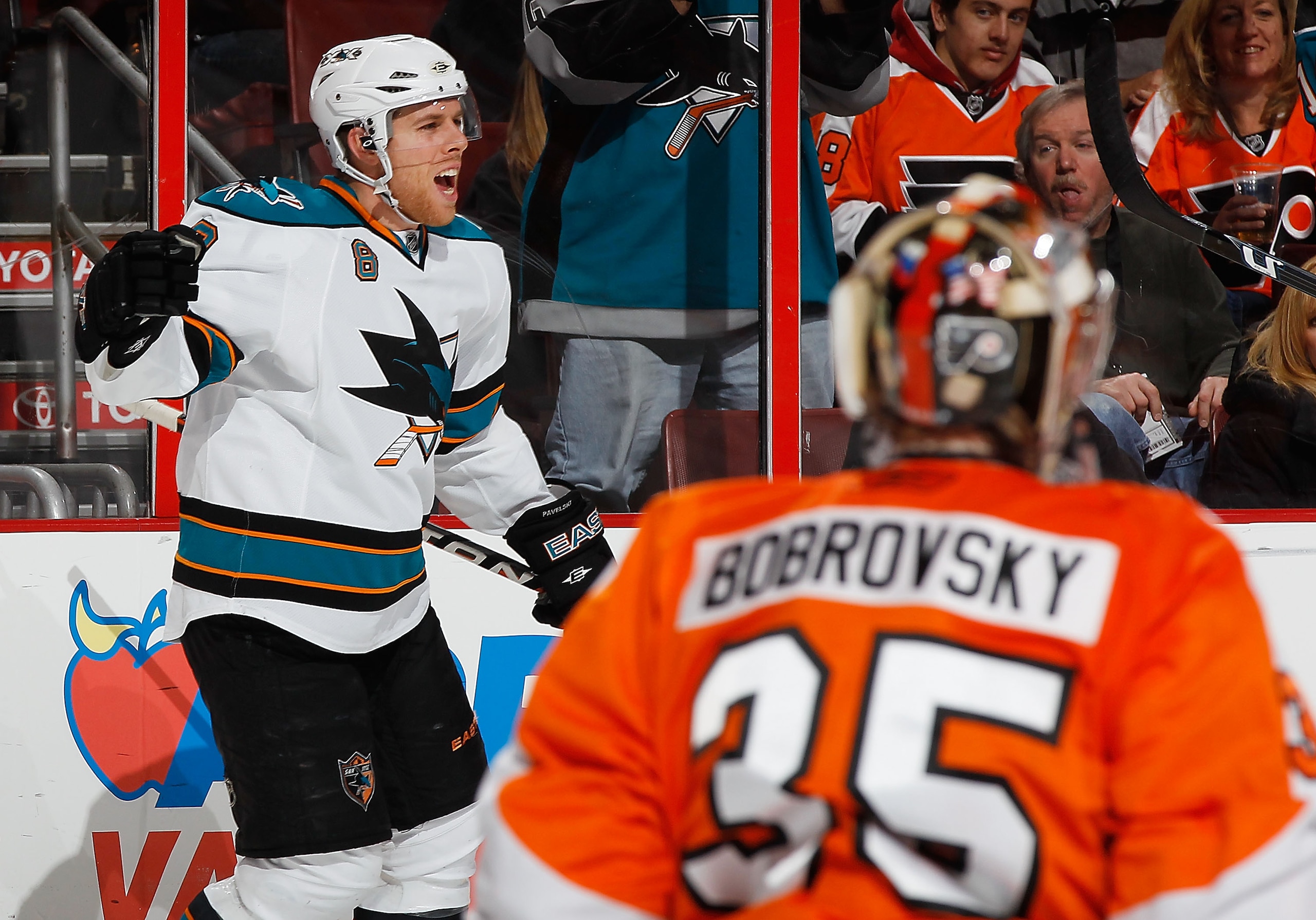 PHILADELPHIA - DECEMBER 08:  Sergei Bobrovsky #35 of the Philadelphia Flyers looks on as Joe Pavelski #8 of the San Jose Sharks celebrates after scoring a game tying goal in the third period on December 8, 2010 at the Wells Fargo Center in Philadelphia, P