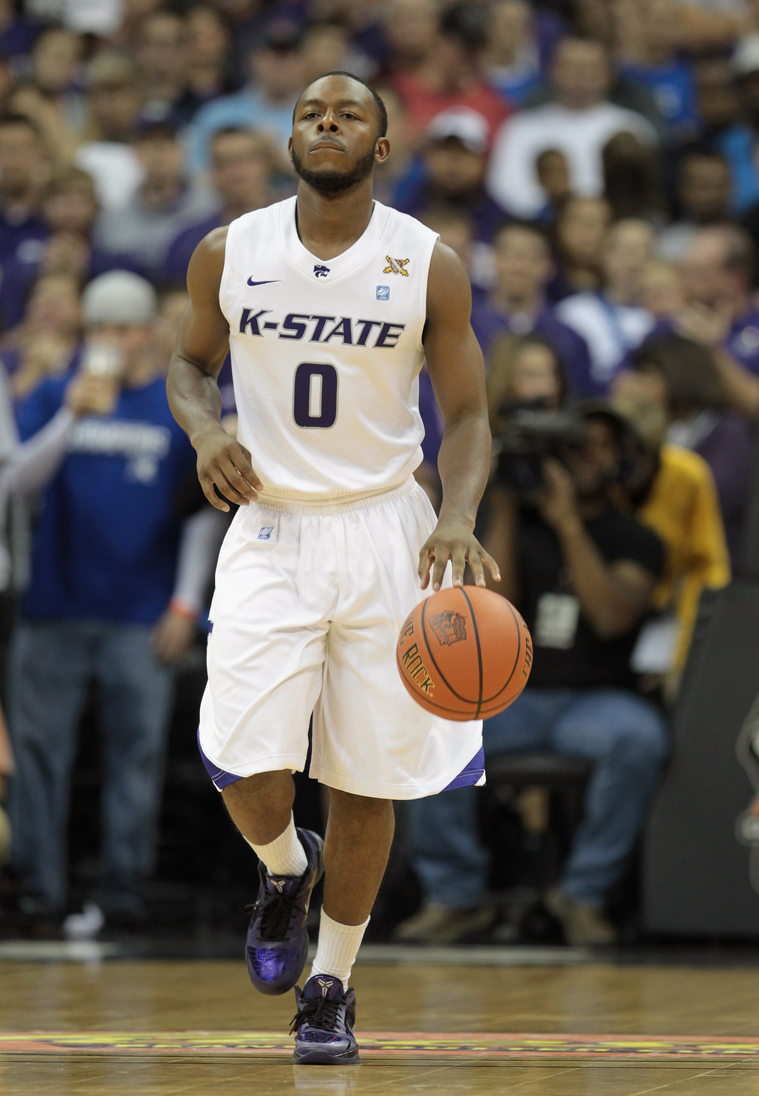 KANSAS CITY, MO - NOVEMBER 23:  Jacob Pullen #0 of the Kansas State Wildcats in action during the CBE Classic championship game against the Duke Blue Devils on November 23, 2010 at the Sprint Center in Kansas City, Missouri.  (Photo by Jamie Squire/Getty