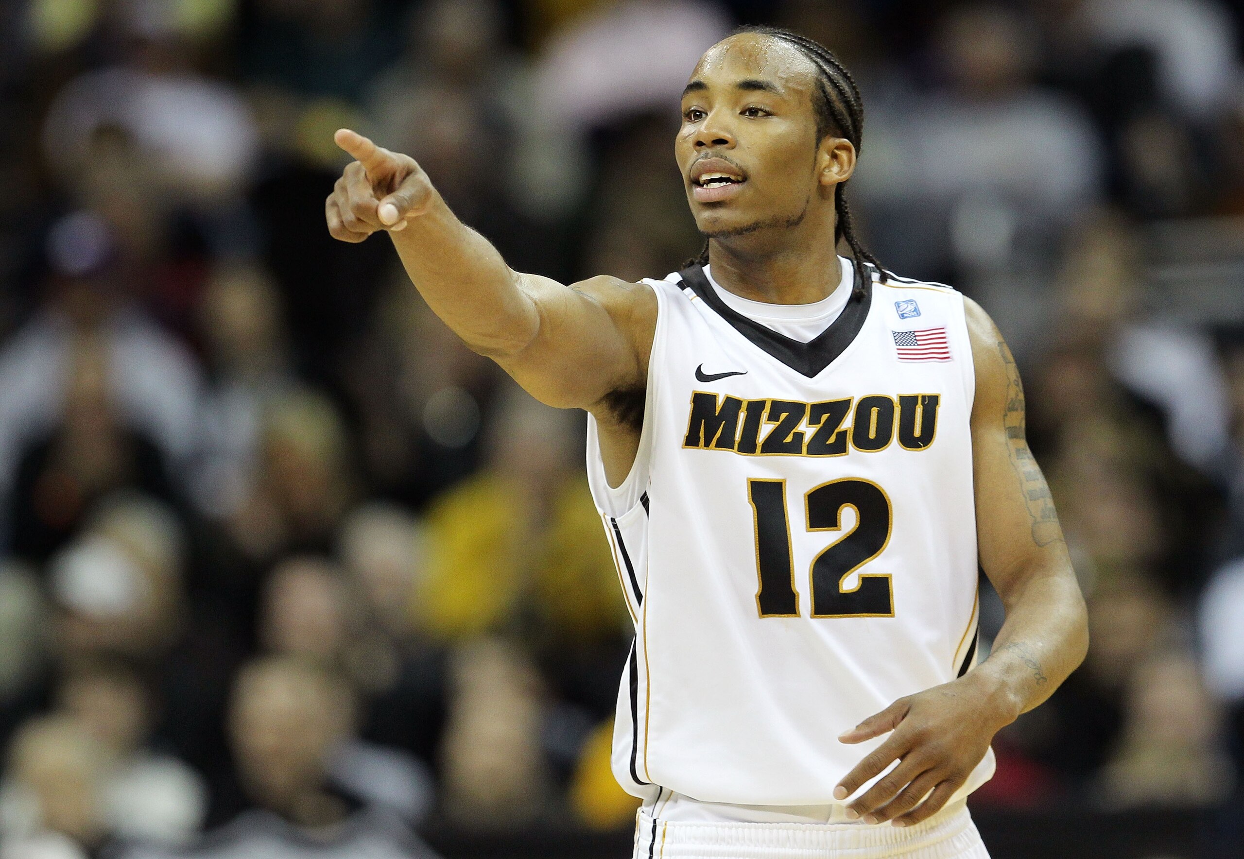 KANSAS CITY, MO - MARCH 09:  Marcus Denmon #12 of the Missouri Tigers signals against the Texas Tech Red Raiders during their first round game in the 2011 Phillips 66 Big 12 Men's Basketball Tournament at Sprint Center on March 9, 2011 in Kansas City, Mis