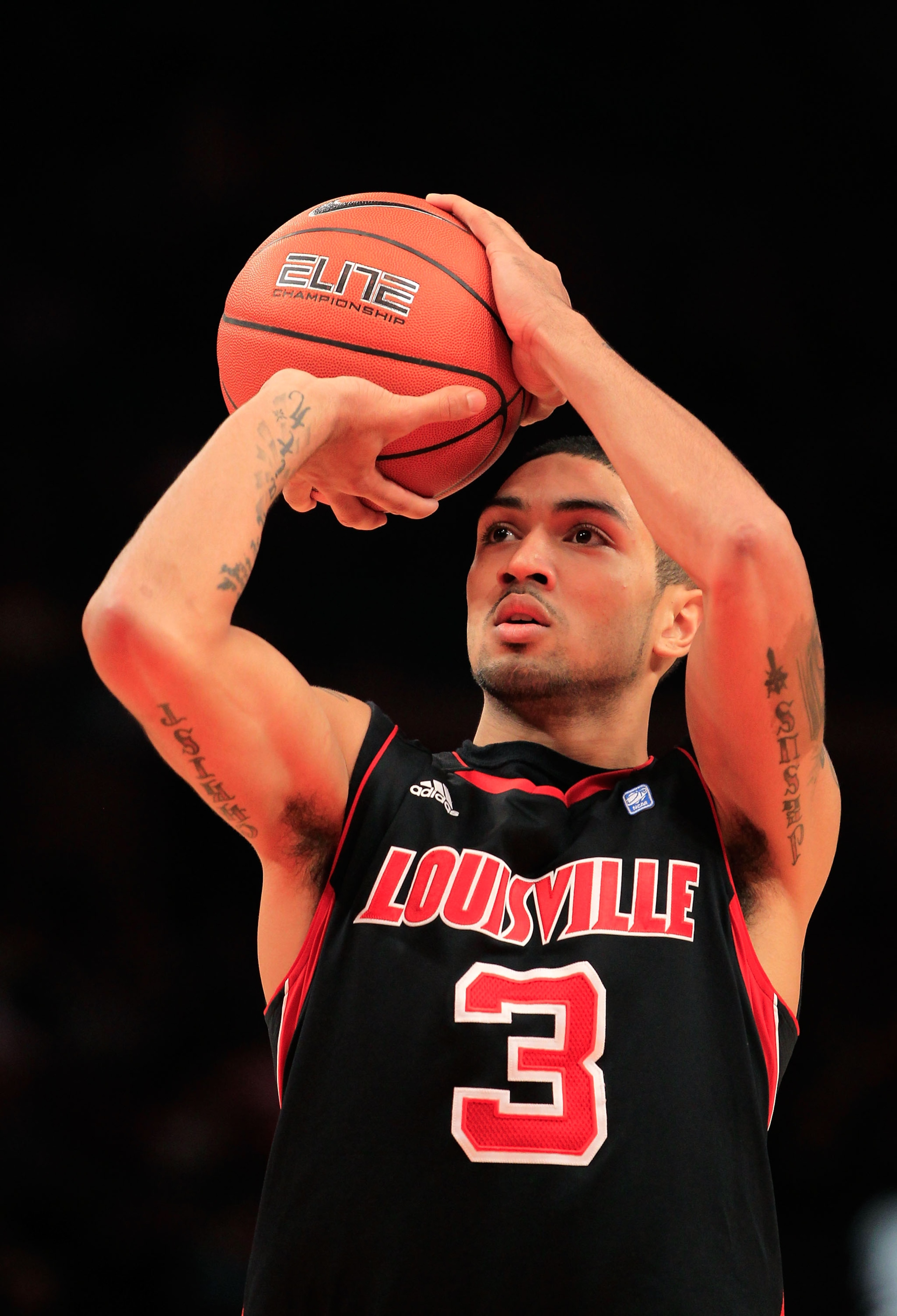 NEW YORK, NY - MARCH 11: Peyton Siva #3 of the Louisville Cardinals shoots a free throw against the Notre Dame Fighting Irish during the semifinals of the 2011 Big East Men's Basketball Tournament presented by American Eagle Outfitters at Madison Square G