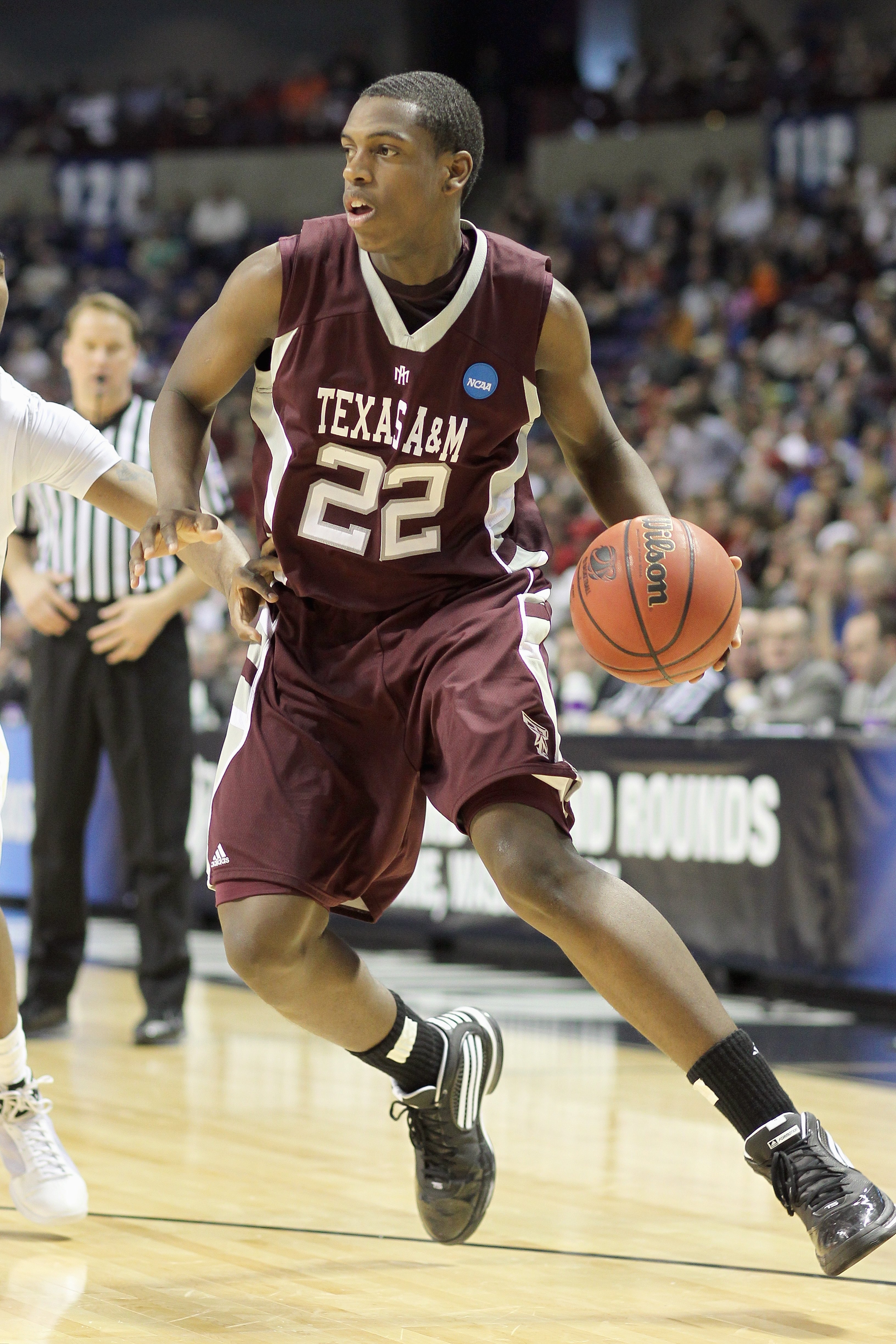SPOKANE, WA - MARCH 21: Khris Middleton #22 of the Texas A&M Aggies drives the ball against the Purdue Boilermakers during the second round of the 2010 NCAA men's basketball tournament at the Spokane Arena on March 21, 2010 in Spokane, Washington. Purdue SPOKANE, WA - MARCH 21: Khris Middleton #22 of the Texas A&M Aggies drives the ball against the Purdue Boilermakers during the second round of the 2010 NCAA men's basketball tournament at the Spokane Arena on March 21, 2010 in Spokane, Washington. Purdue