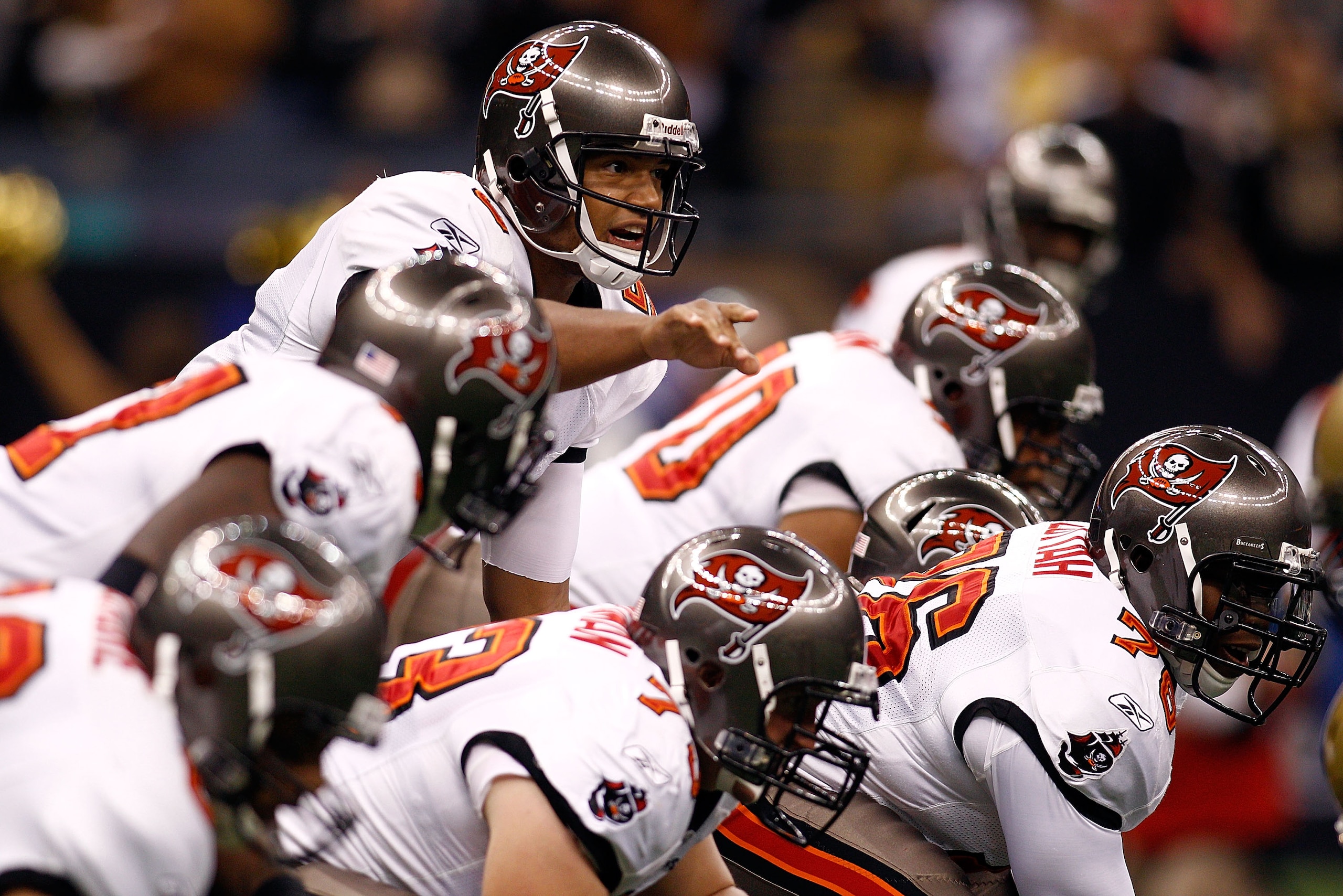 NEW ORLEANS, LA - JANUARY 02:  Quarterback Josh Freeman #5  of the Tampa Bay Buccaneers points out coverage before snapping the ball during the game against the New Orleans Saints at the Louisiana Superdome on January 2, 2011 in New Orleans, Louisiana.  (