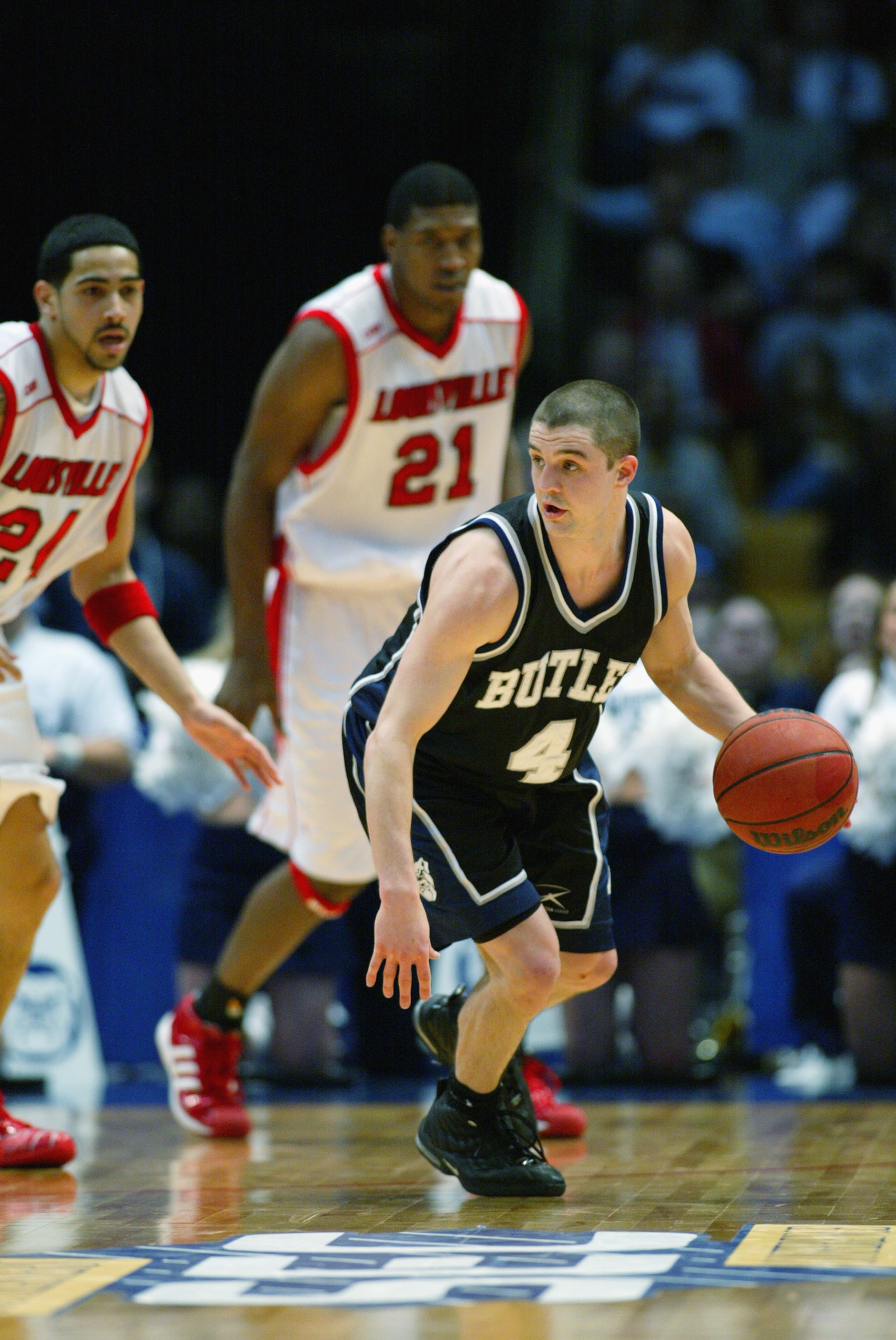 BIRMINGHAM, AL - MARCH 23: Brandon Miller #4 of Butler drives against Louisville during the NCAA Tournament on March 23, 2003 at the Birmingham Civic Center in Birmingham, Alabama. Butler defeated Louisville 79-71. (Photo by Jamie Squire/Getty Images) BIRMINGHAM, AL - MARCH 23: Brandon Miller #4 of Butler drives against Louisville during the NCAA Tournament on March 23, 2003 at the Birmingham Civic Center in Birmingham, Alabama. Butler defeated Louisville 79-71. (Photo by Jamie Squire/Getty Images)