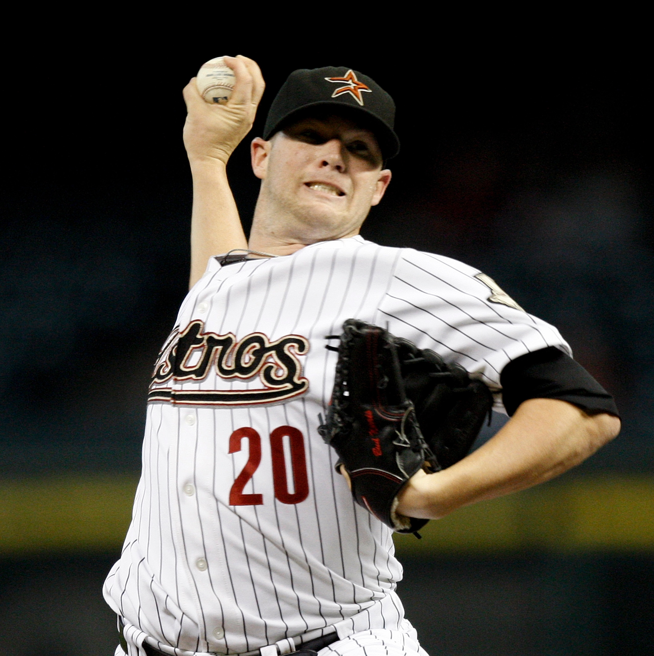 HOUSTON - AUGUST 19:  Pitcher Bud Norris #20 of the Houston Astros throws against the New York Mets in the first inning at Minute Maid Park on August 19, 2010 in Houston, Texas.  (Photo by Bob Levey/Getty Images)