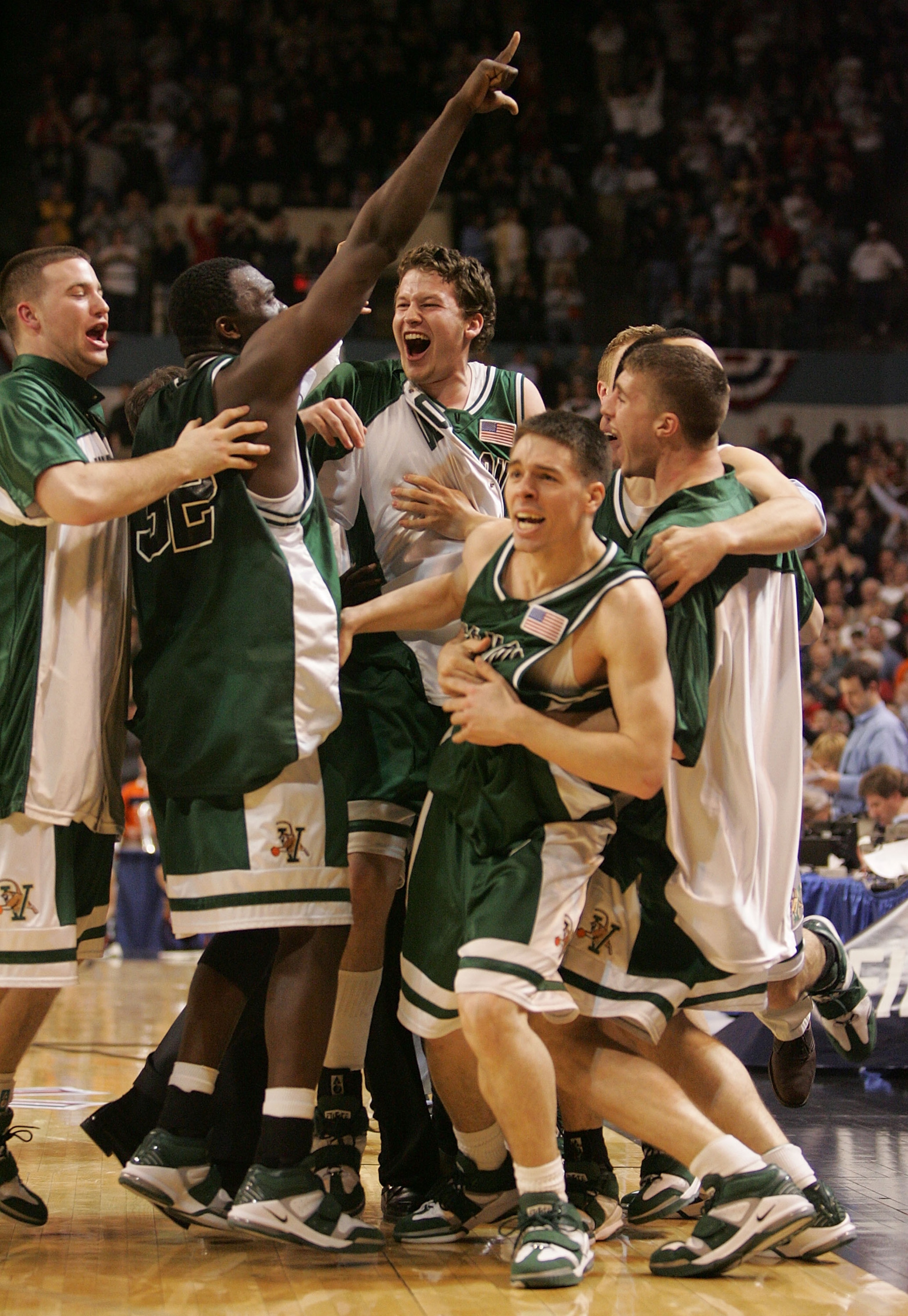 WORCESTER, MA - MARCH 18: Members of the Vermont Catamounts celebrate after defeating the Syracuse Orange during the first round of the NCAA Men's Basketball Championship at the DCU Center March 18, 2005 in Worcester, Massachusetts. (Photo By Jim McIsaa WORCESTER, MA - MARCH 18: Members of the Vermont Catamounts celebrate after defeating the Syracuse Orange during the first round of the NCAA Men's Basketball Championship at the DCU Center March 18, 2005 in Worcester, Massachusetts. (Photo By Jim McIsaa